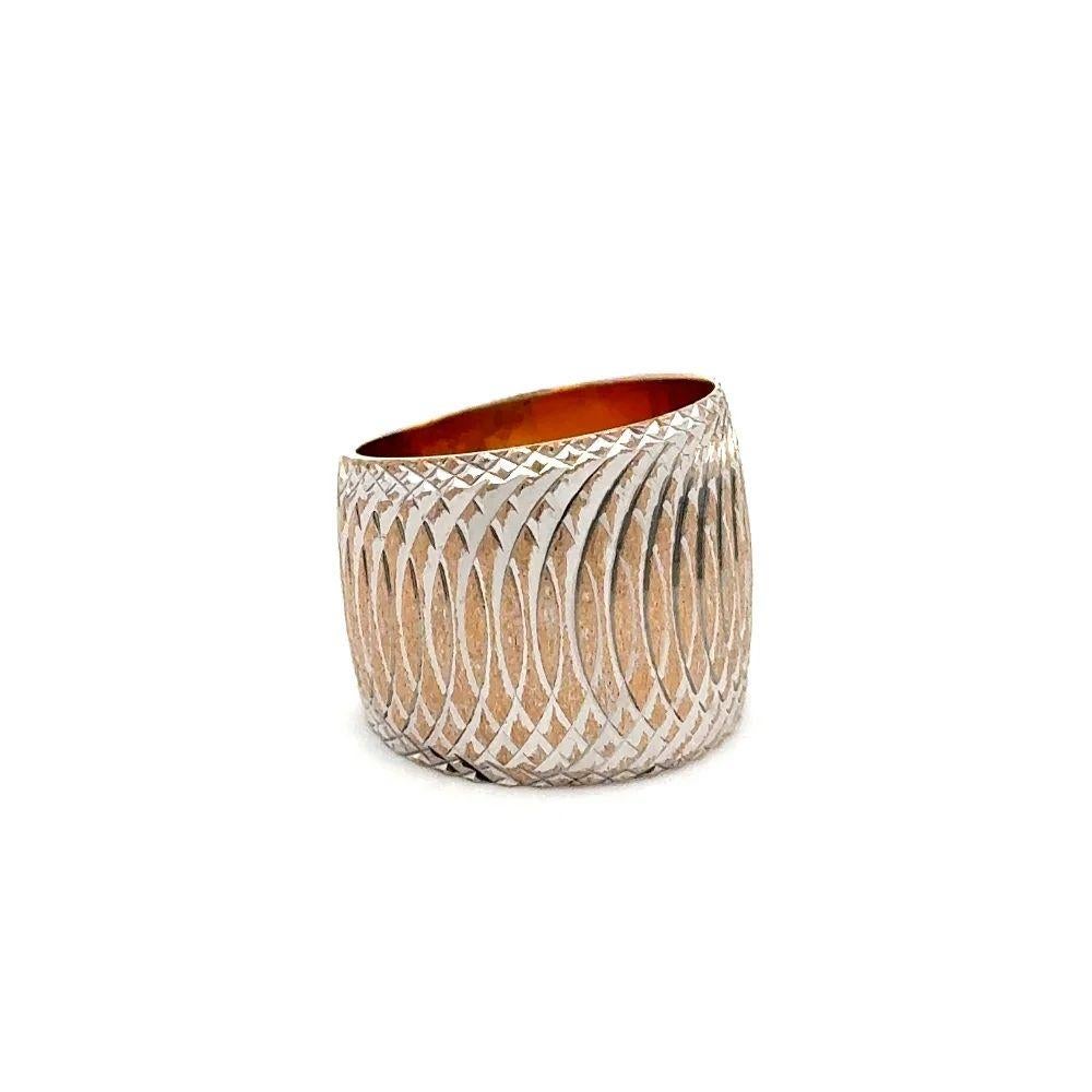 Simply Fabulous! Vintage Red Carpet Diamond Cut Spiral Design 16.5mm Band Ring. Beautifully Hand crafted in 2-Tone 14K Yellow and White Gold. Ring size 5.75, we offer ring resizing. More Beautiful in real time! Unique and Timeless…A piece you’ll