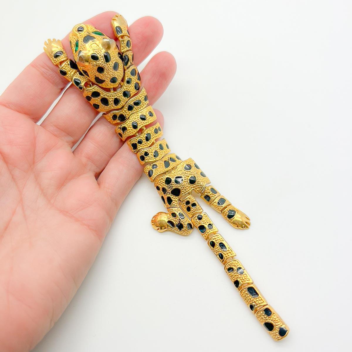 A Vintage Statement Leopard Brooch. Adorn your shoulder with this wonderfully long and dramatic big cat pin.
An unsigned beauty. A rare treasure. Just because a jewel doesn’t carry a designer name, doesn’t mean it isn't coveted. The unsigned