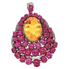 Colgante vintage de plata con cabujón de rubí, citrino y diamantes talla brillante
