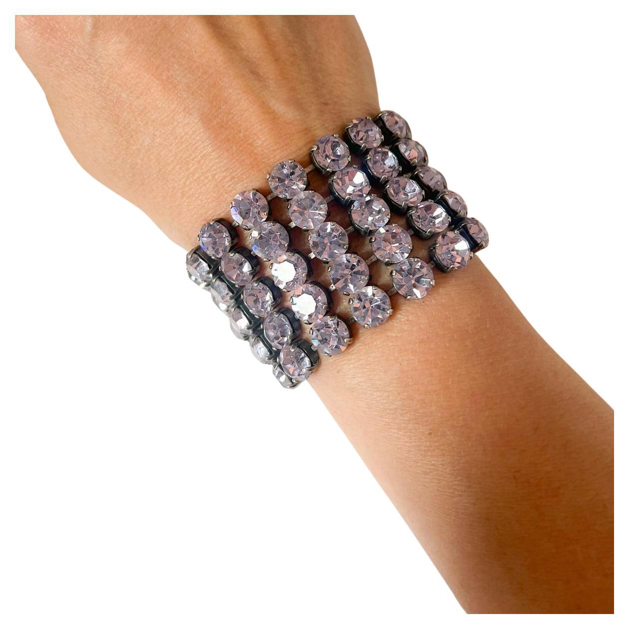 A beautiful wide Alexandrite Vintage Lilac Crystal Cuff. Five rows of gorgeous claw set, chaton crystals sparkle in the most alluring way. The alexandrite crystals (an interpretation of precious Alexandrite stones) change from lilac to pale aqua