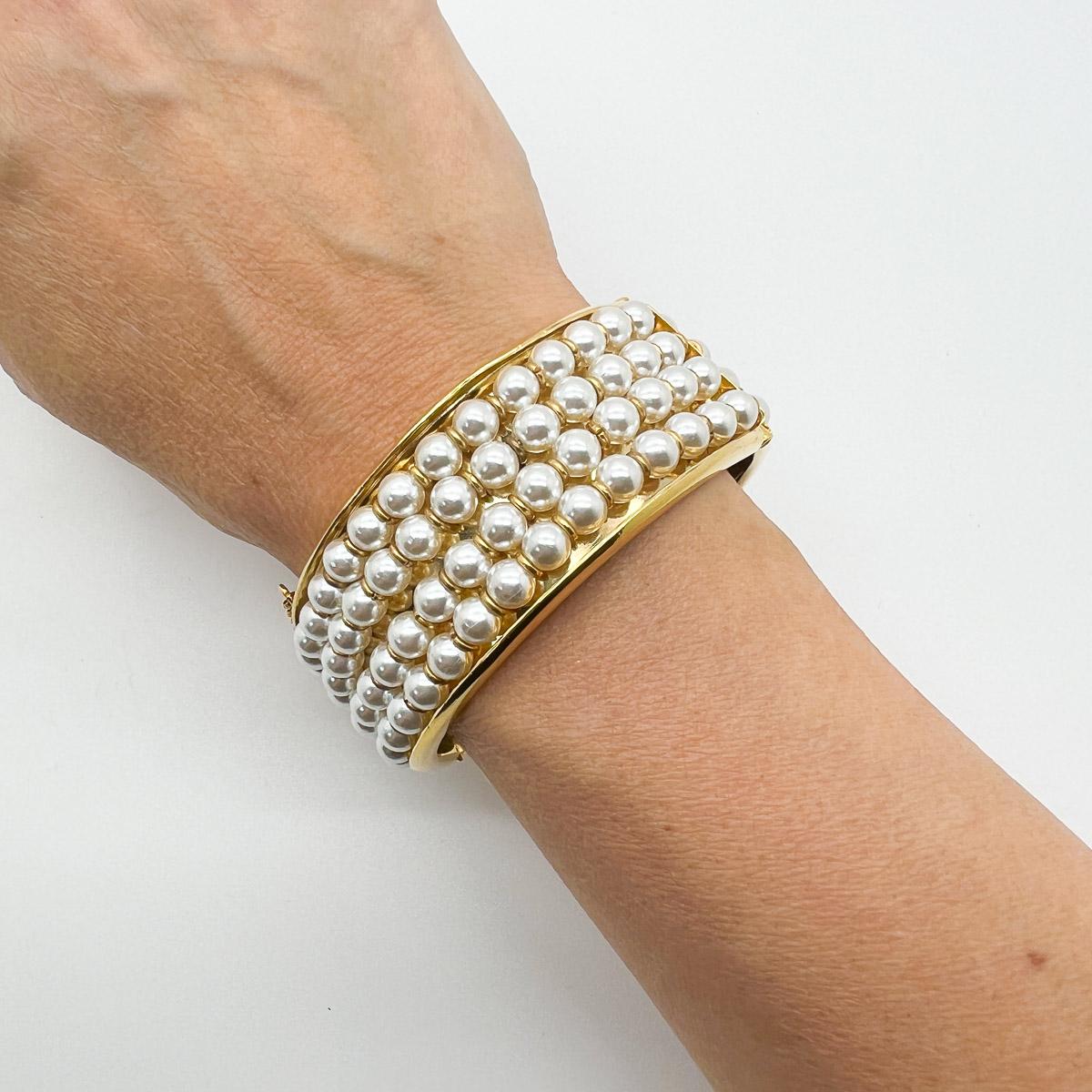 A dramatic vintage Whole Pearl Bangle. A broad band adorned with heaps of whole pearls. The chicest statement adornment.

An unsigned beauty. A rare treasure. Just because a jewel doesn’t carry a designer name, doesn’t mean it isn't coveted. The