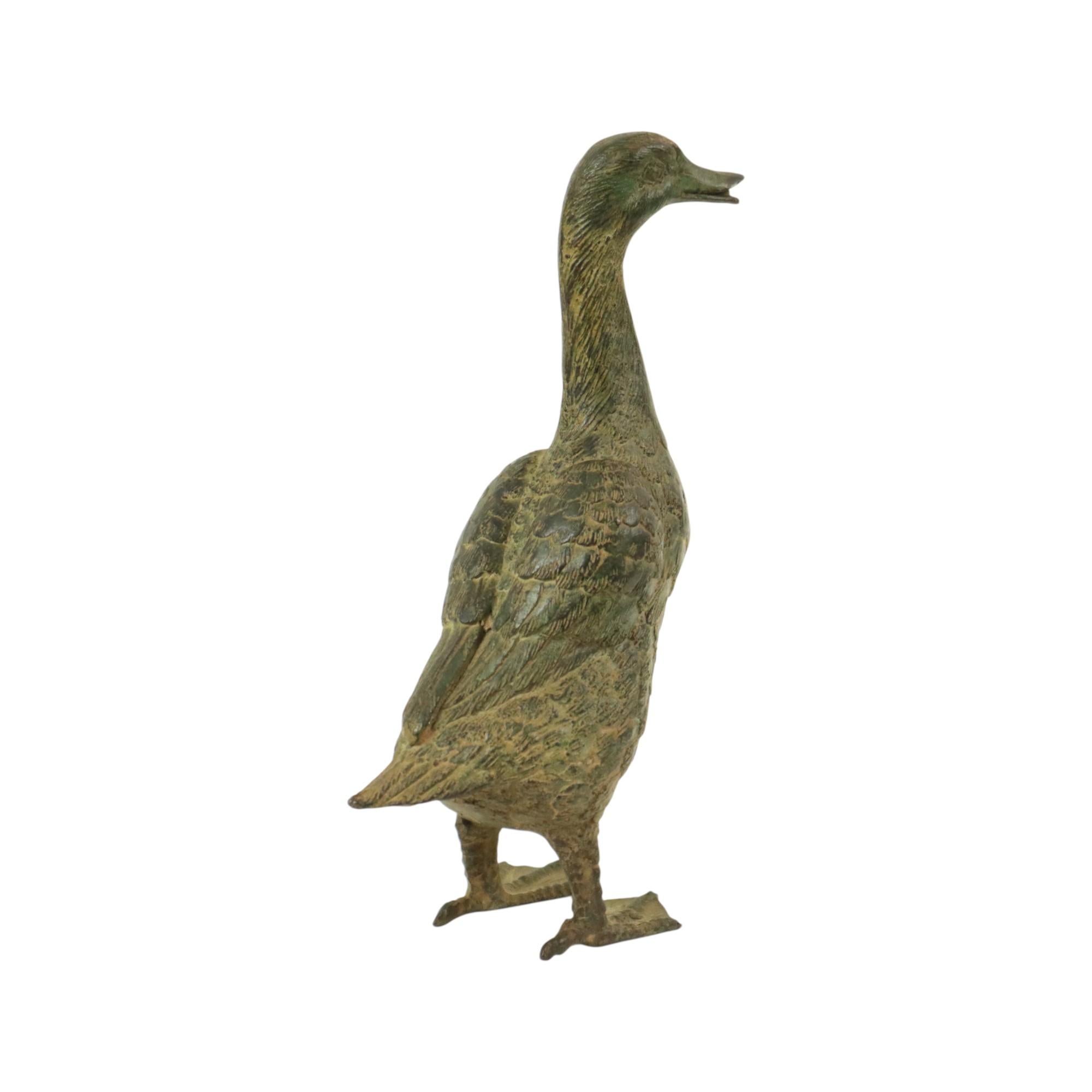 Europeo Statua d'epoca di corridore indiano Anatra in bronzo patinato XX secolo in vendita