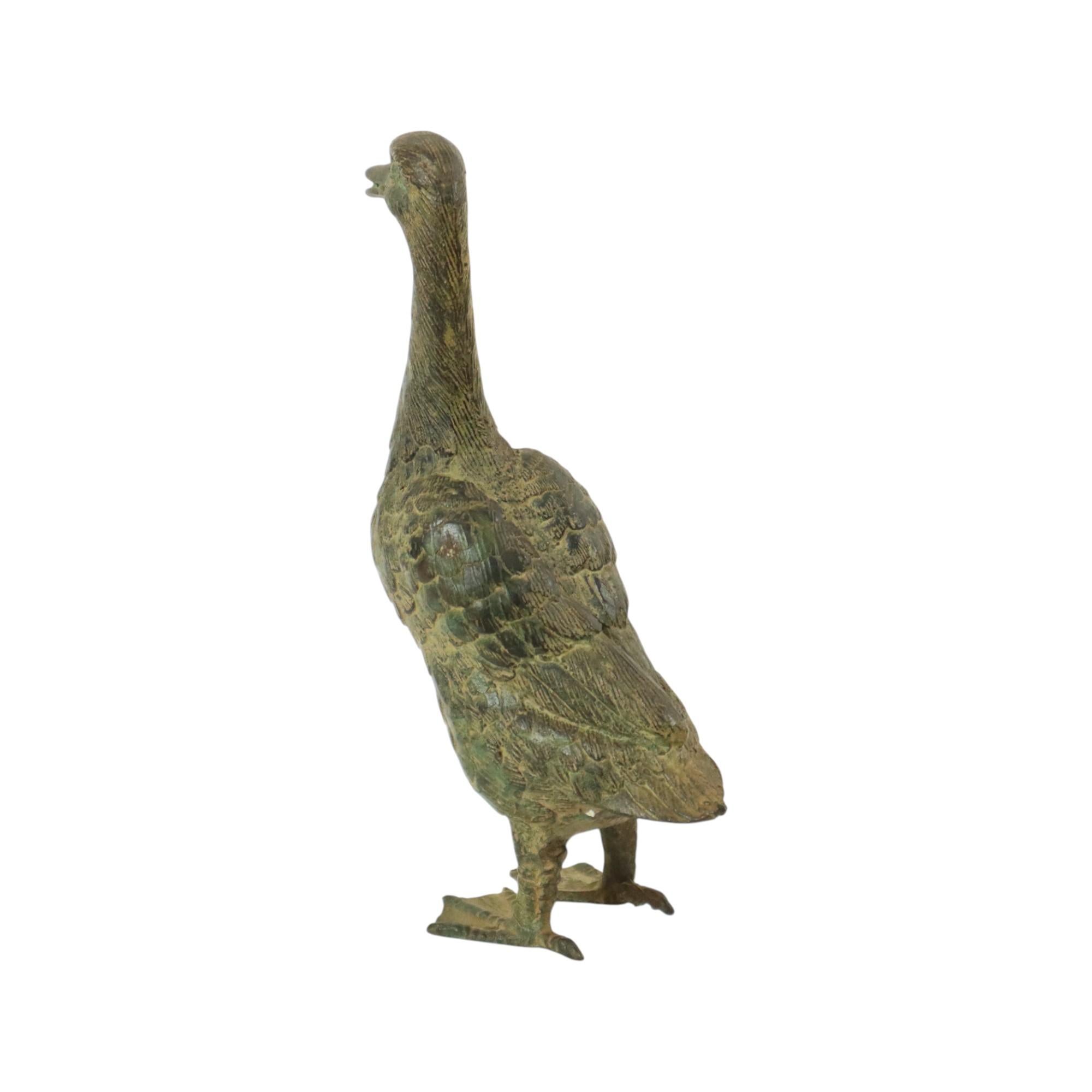 Patinato Statua d'epoca di corridore indiano Anatra in bronzo patinato XX secolo in vendita
