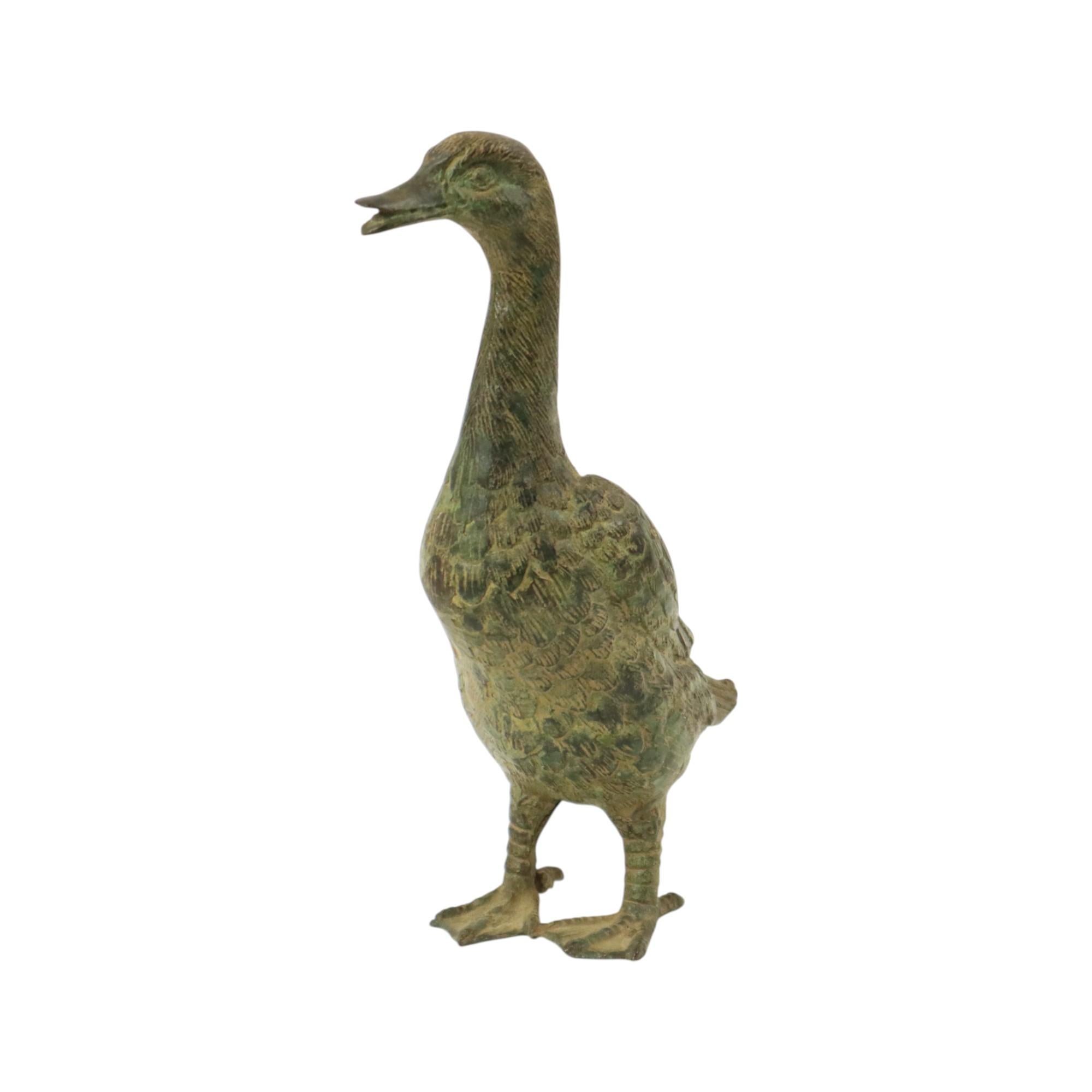 Bronzo Statua d'epoca di corridore indiano Anatra in bronzo patinato XX secolo in vendita