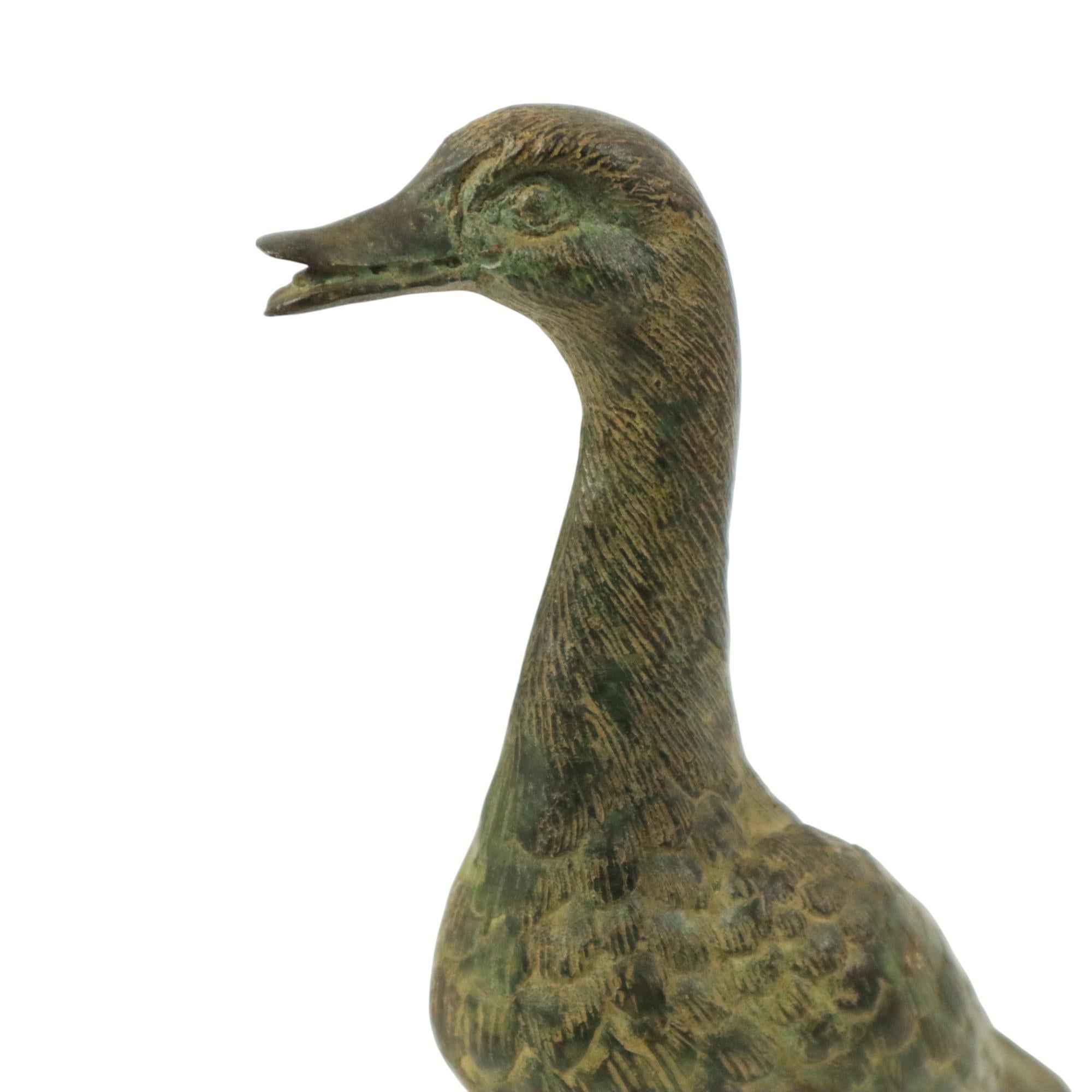 Statua d'epoca di corridore indiano Anatra in bronzo patinato XX secolo in vendita 1