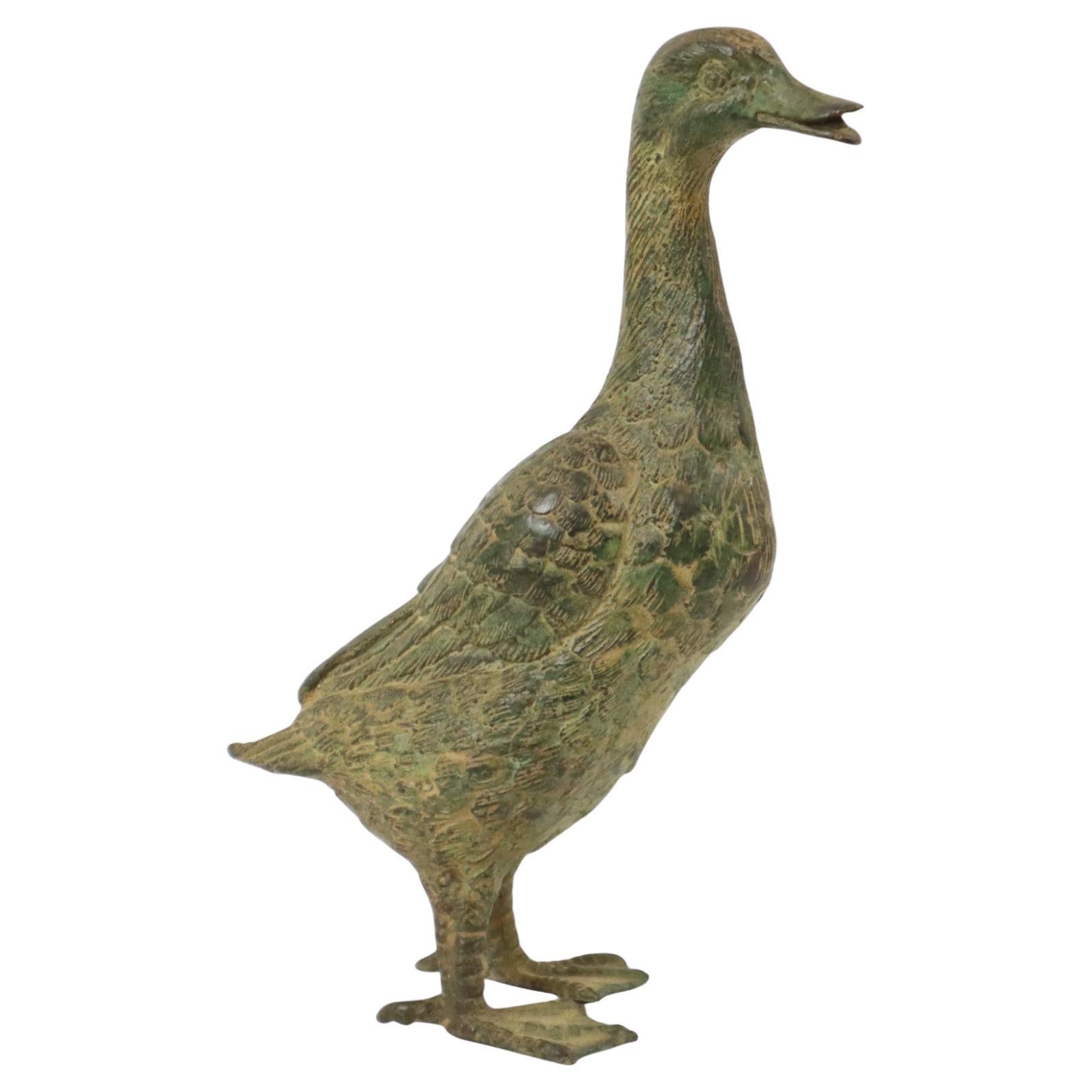 Statua d'epoca di corridore indiano Anatra in bronzo patinato XX secolo
