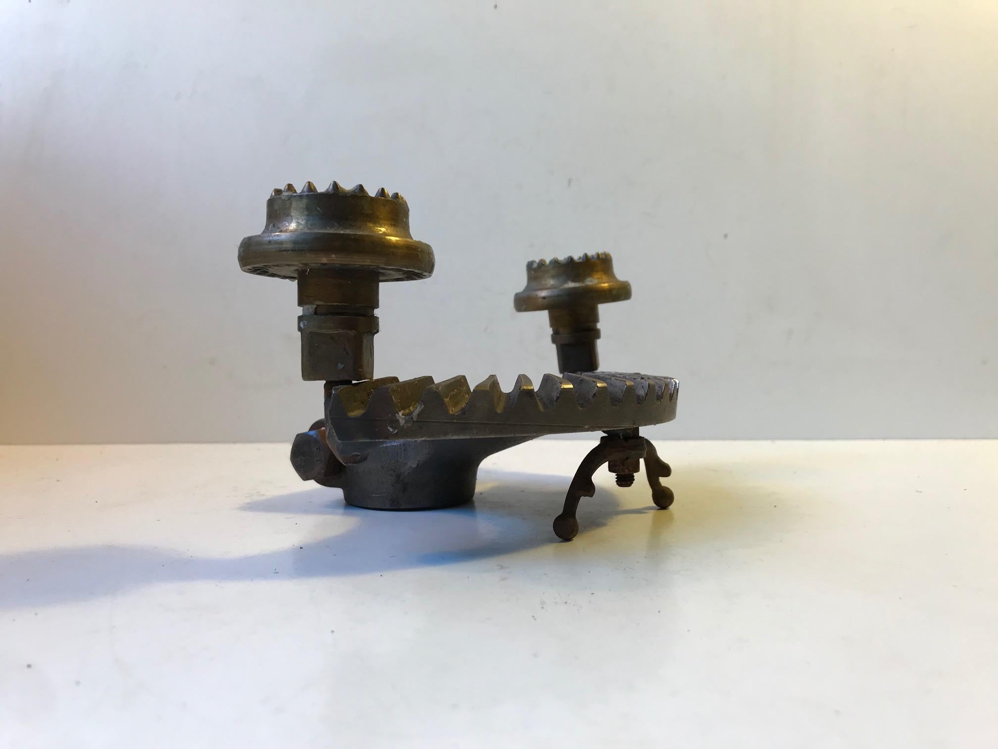 Unique candleholder fashioned out of old iron and brass scrap/spareparts. Anonymous Danish metal worker/artist, circa 1970. It is to be fitted with regular sized candles.