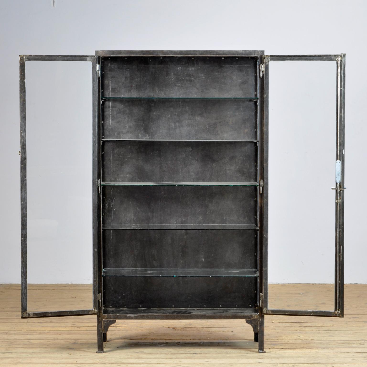 metal and glass cabinet
