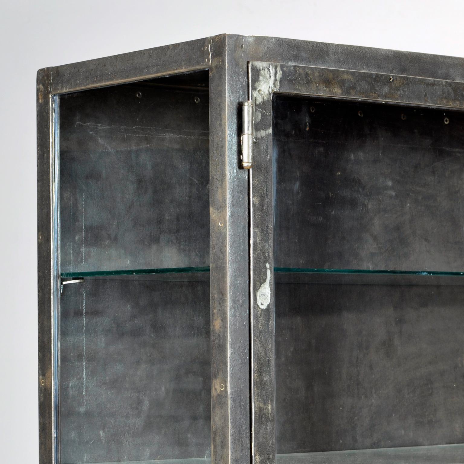 vintage industrial display cabinet