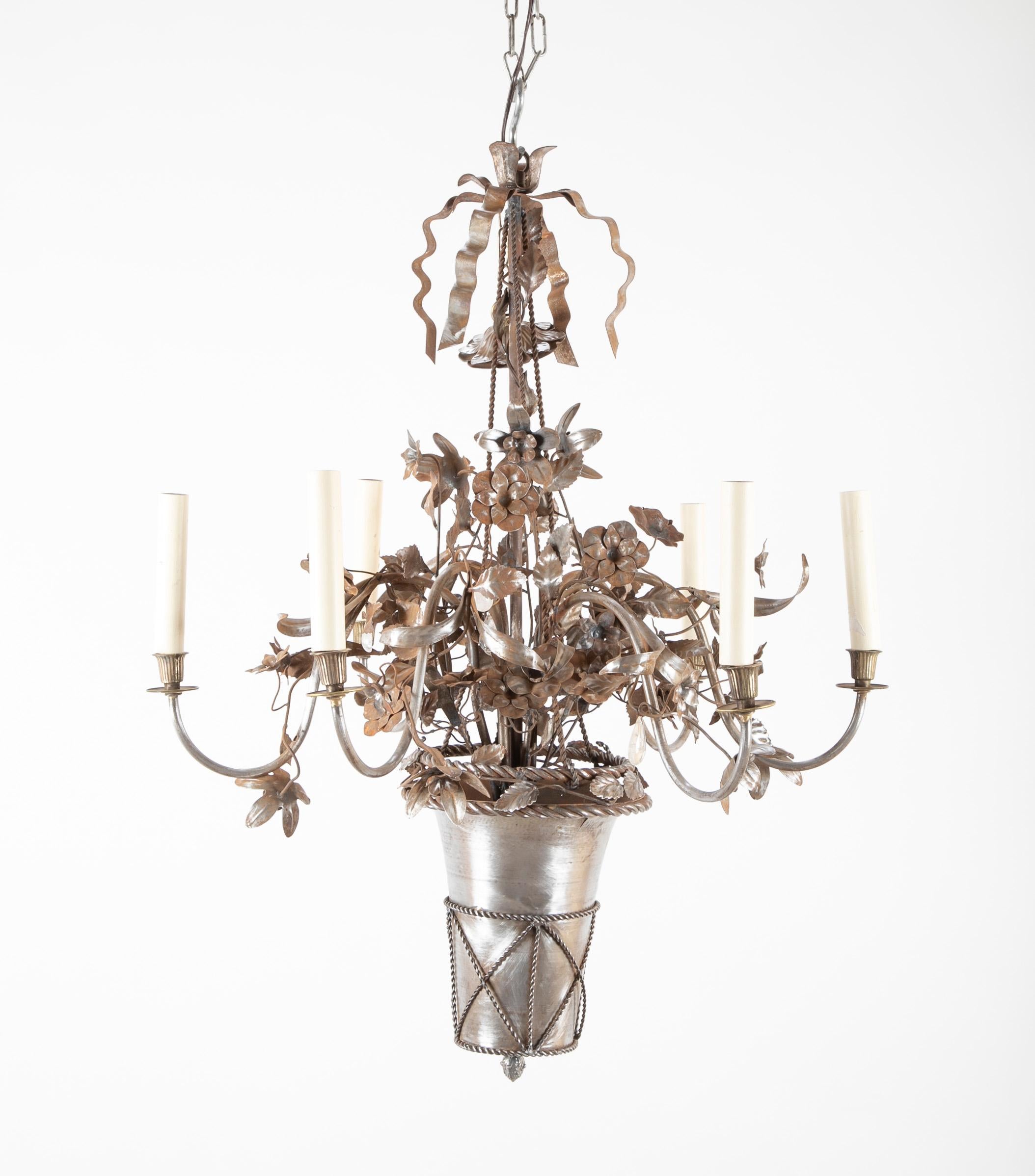 Vintage steel floral chandelier with basket, bow knots and ribbons.