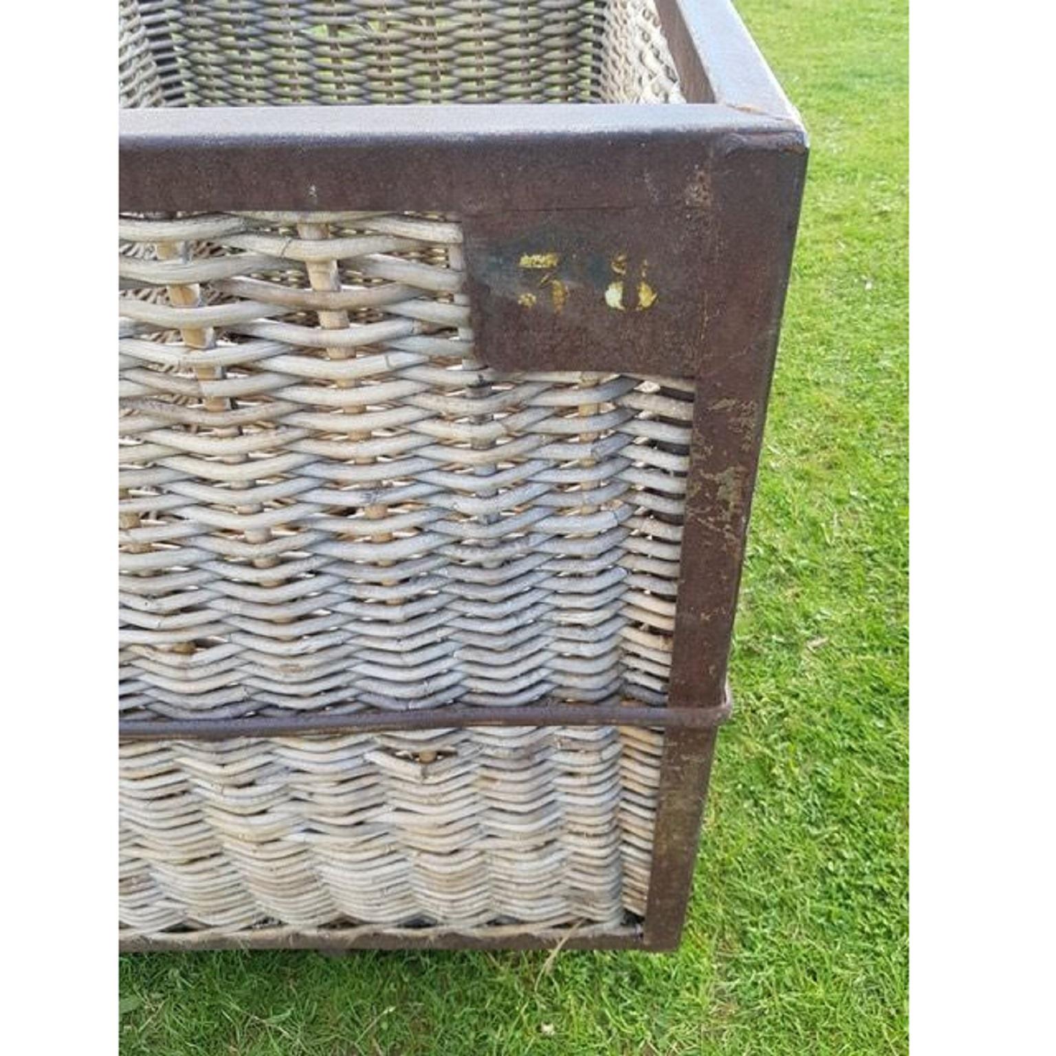 vintage wicker laundry basket on wheels