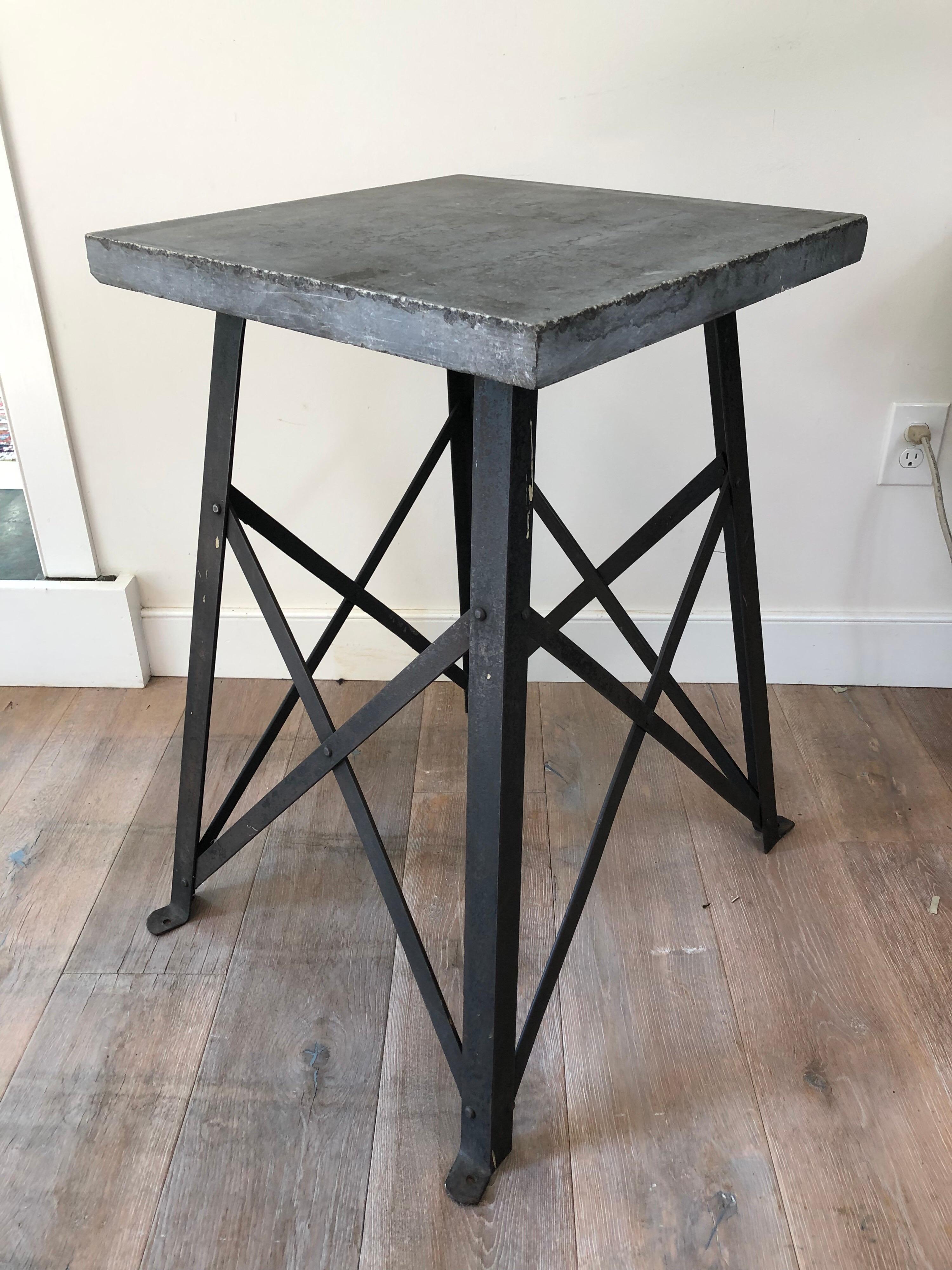 A vintage steel base trestle table or pedestal with slate top. Stone top measures 19.75