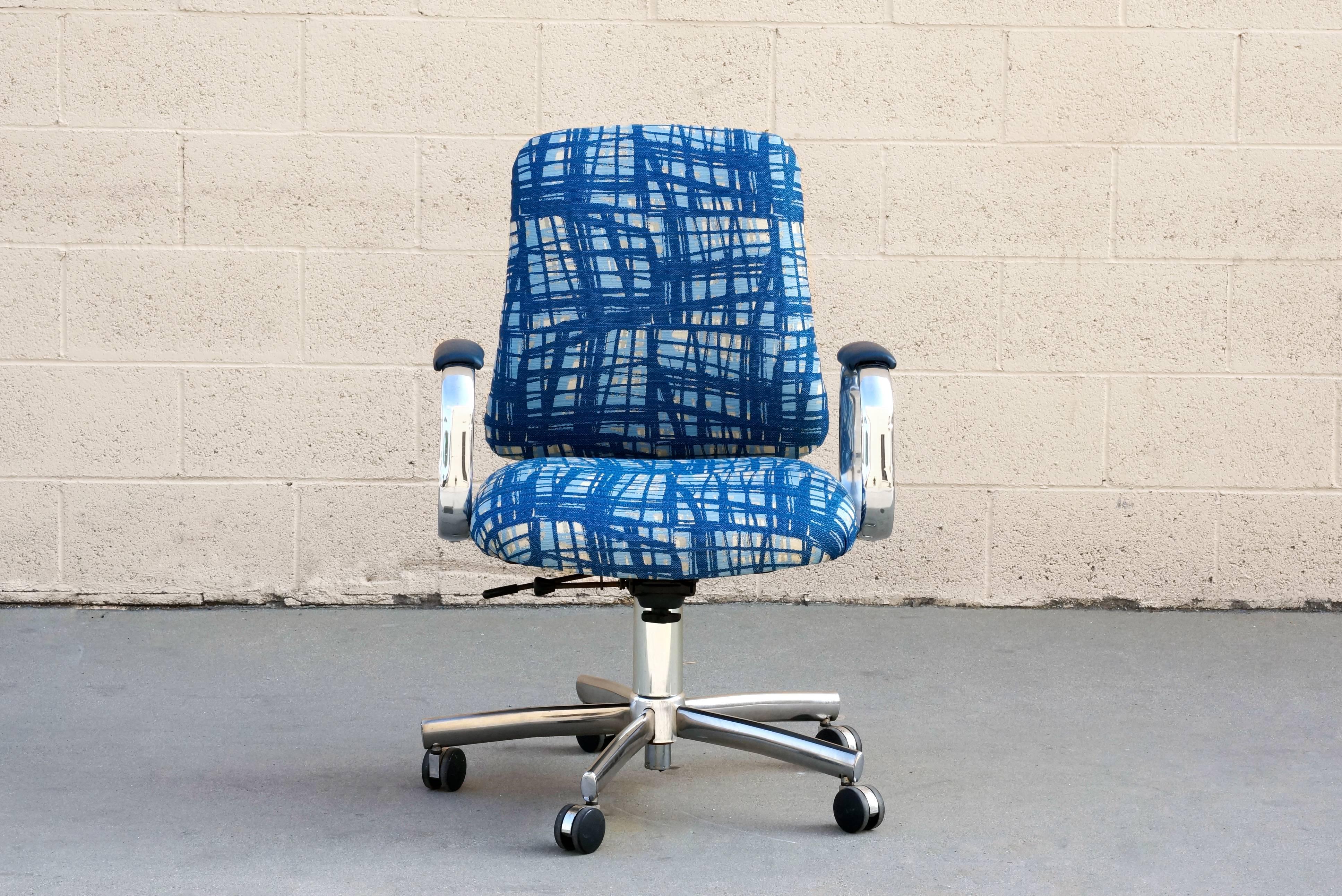 Vintage steel case executive steno, circa 1990s, with classic midcentury aesthetic. Features modernist chrome arms and base. Newly reupholstered in abstract blue woven fabric with blue vinyl armrests. Adjustable seat height. Tilts and swivels.