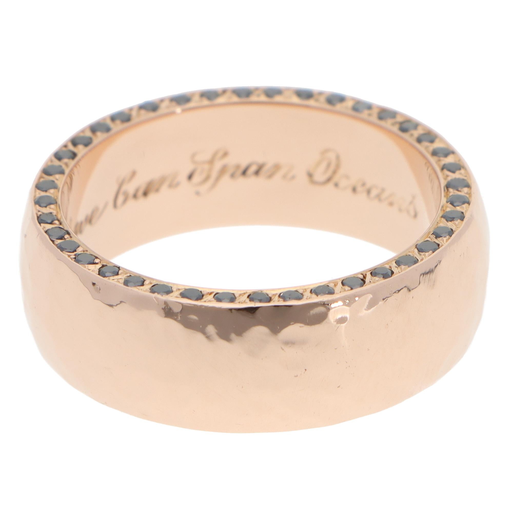 A stylish vintage Stephen Webster black diamond wedding band set in 18k rose gold.

From Stephen Webster's discontinued wedding collection, the ring is composed of a 7.5-millimetre rose gold band. On one side of the band, it is set with 40 round