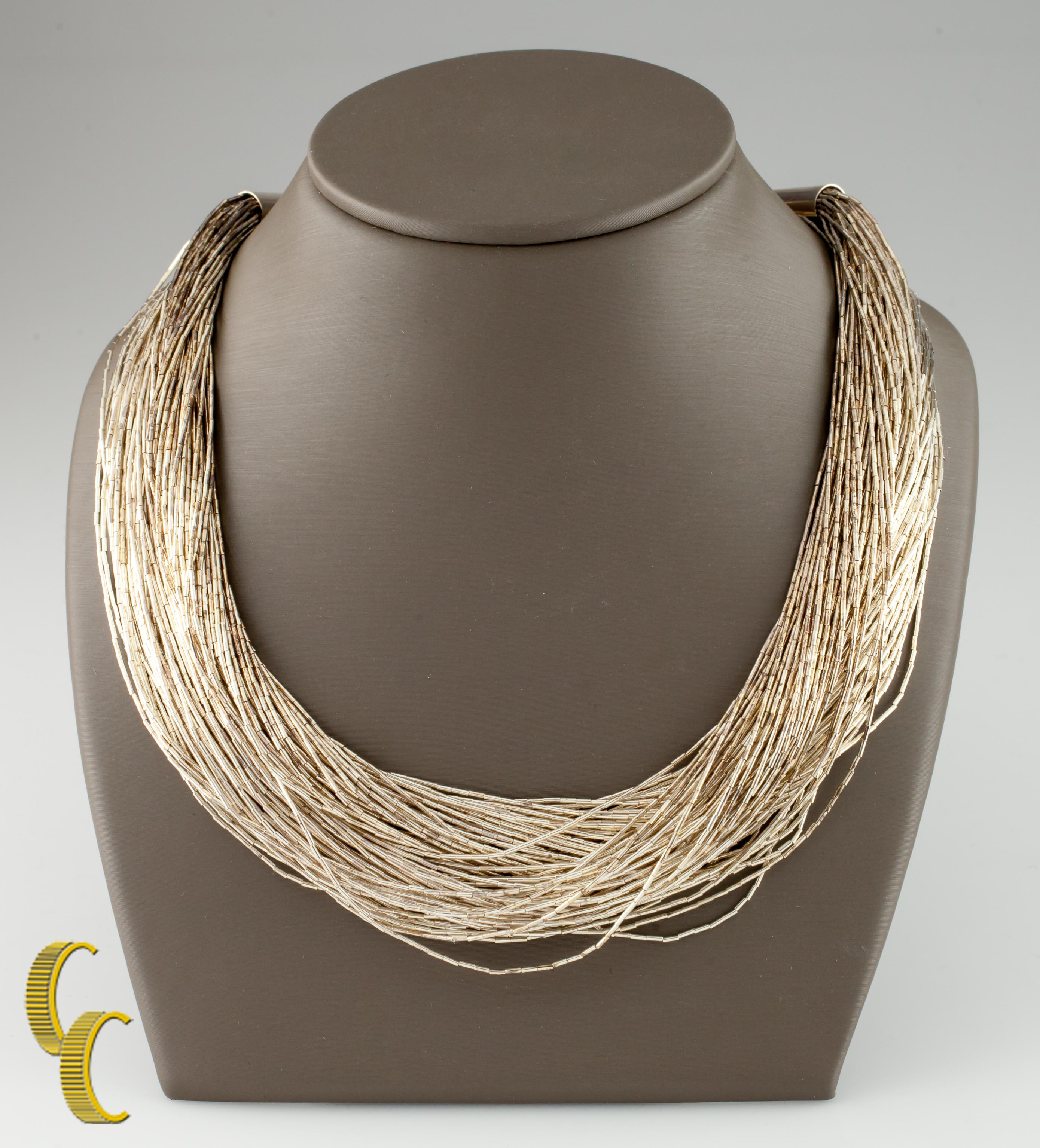 Includes 45 strands of small, skinny sterling silver beads.
Piece is in good condition and shows few signs of aging or wear.
Length: Approximately 35 inches (17 inches and 90 strands when doubled).
Metal: 0.925 sterling silver.
Weight: 79.0 grams.