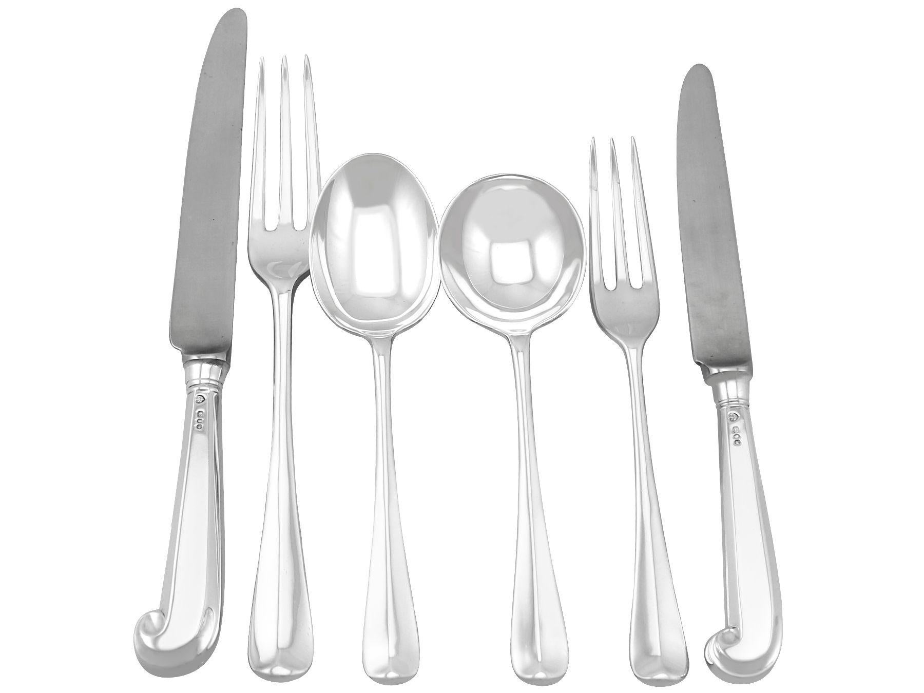 An exceptional, fine and impressive vintage Elizabeth II English sterling silver straight three pronged Hanoverian rat tail pattern canteen of cutlery with pistol grip knives for eight persons; an addition to our silver flatware sets

The pieces of