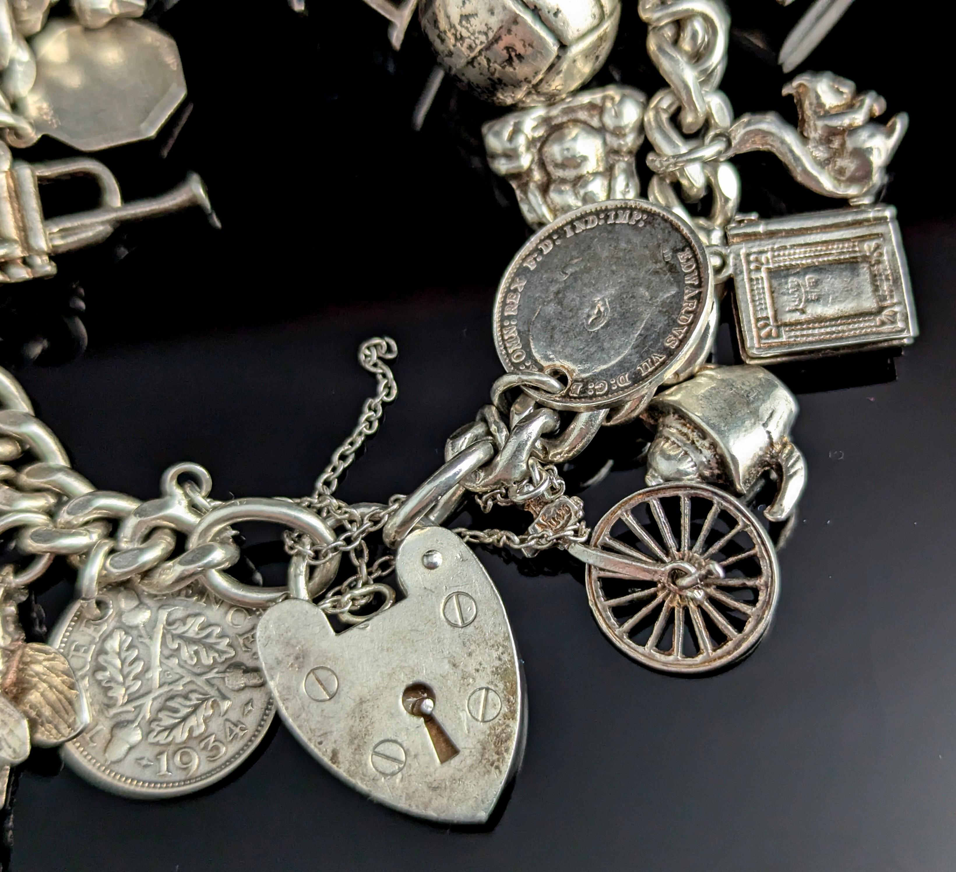 Vintage sterling silver charm bracelet, heavy, loaded 4