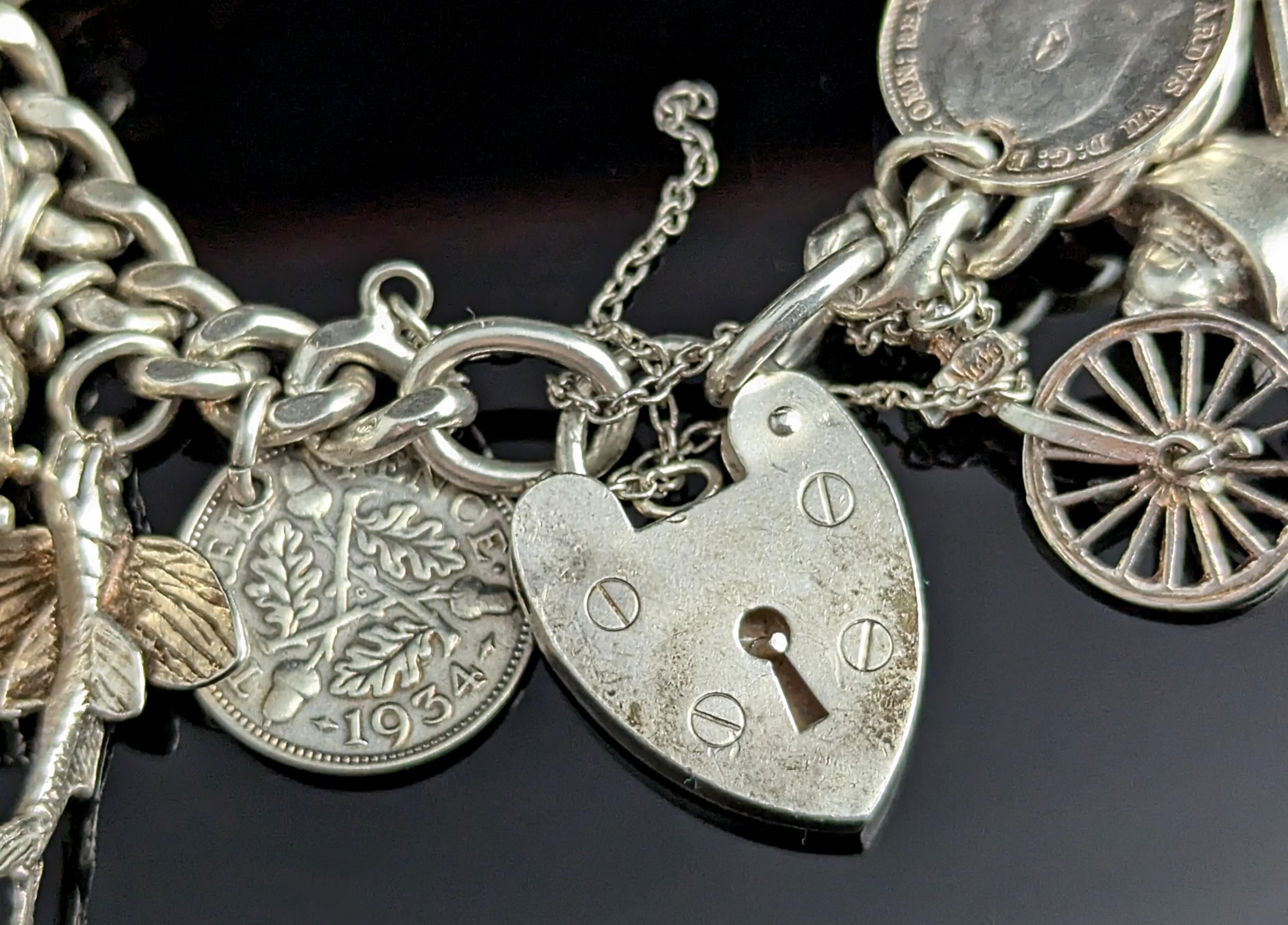 Vintage sterling silver charm bracelet, heavy, loaded 5