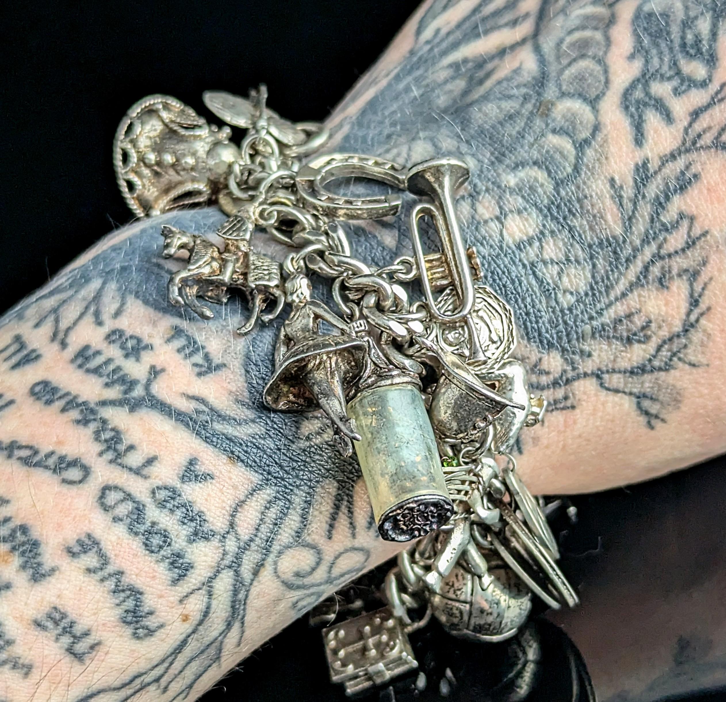 Vintage sterling silver charm bracelet, heavy, loaded In Good Condition In NEWARK, GB