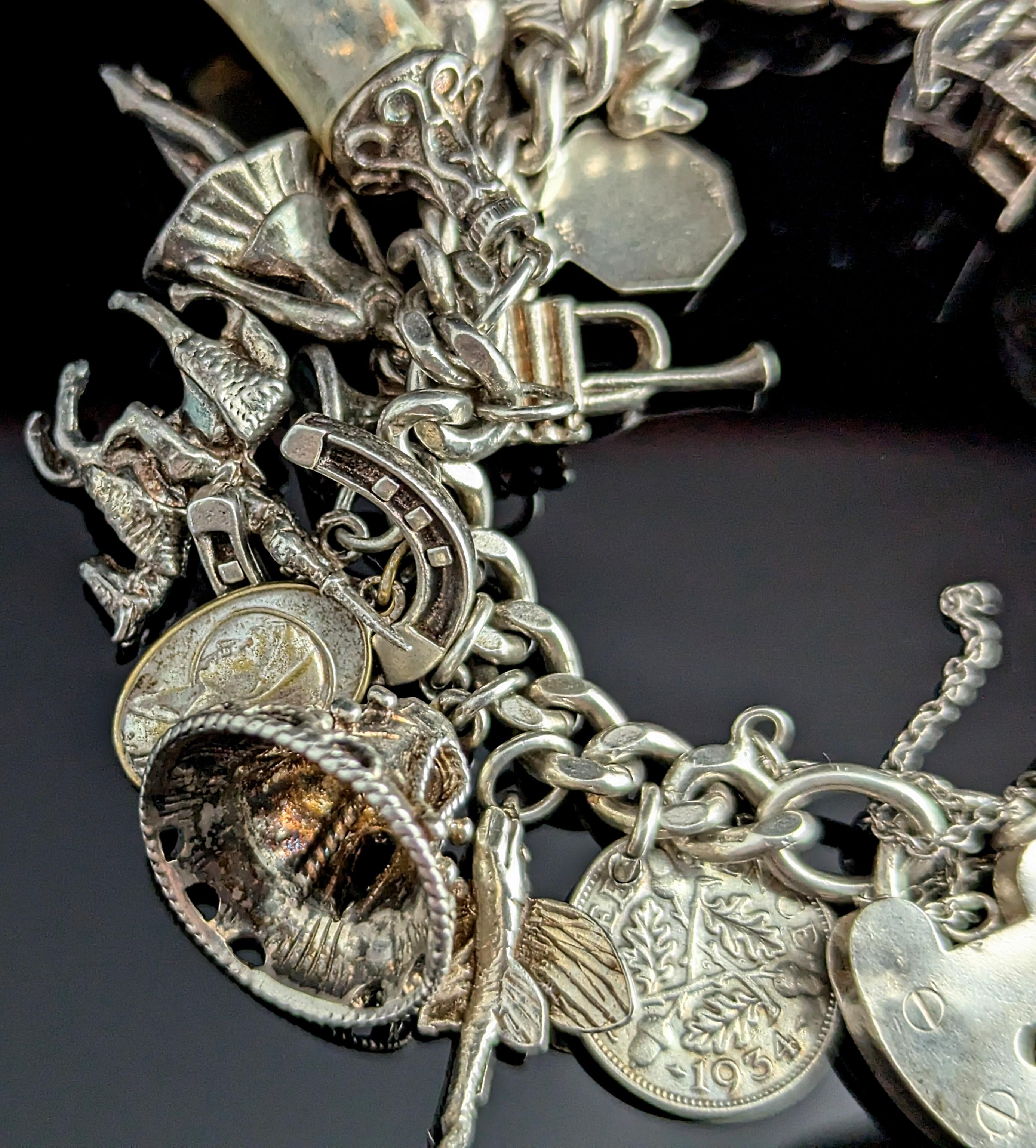 Women's Vintage sterling silver charm bracelet, heavy, loaded