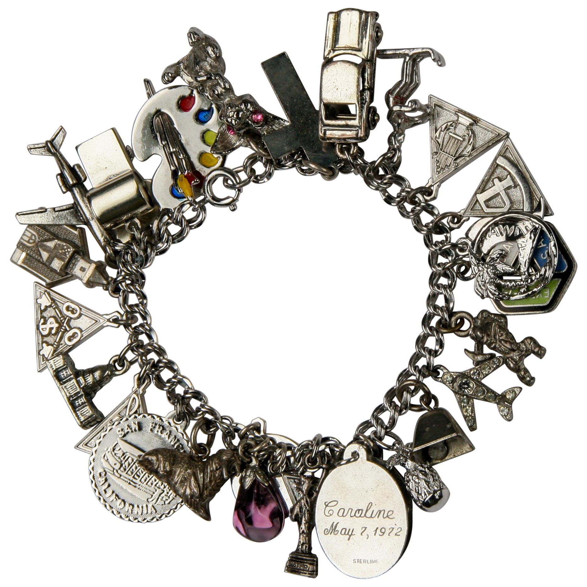 Vintage Sterling Silver Charm Bracelet with 27 Various Charms, Size 7 For Sale