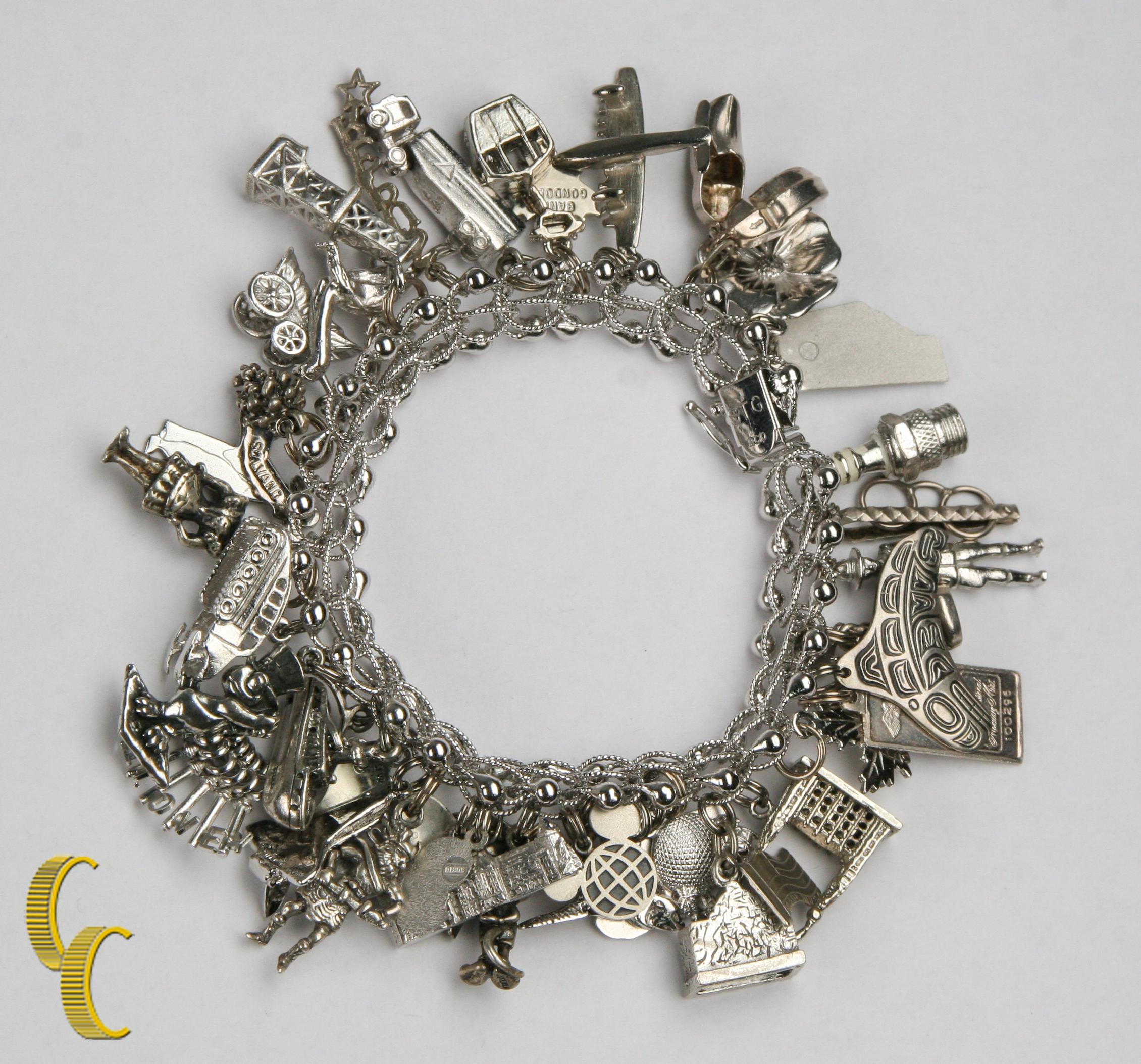 da uomo o donna Bracciale Charm vintage in argento sterling con 35 charme vari, misura 7 in vendita