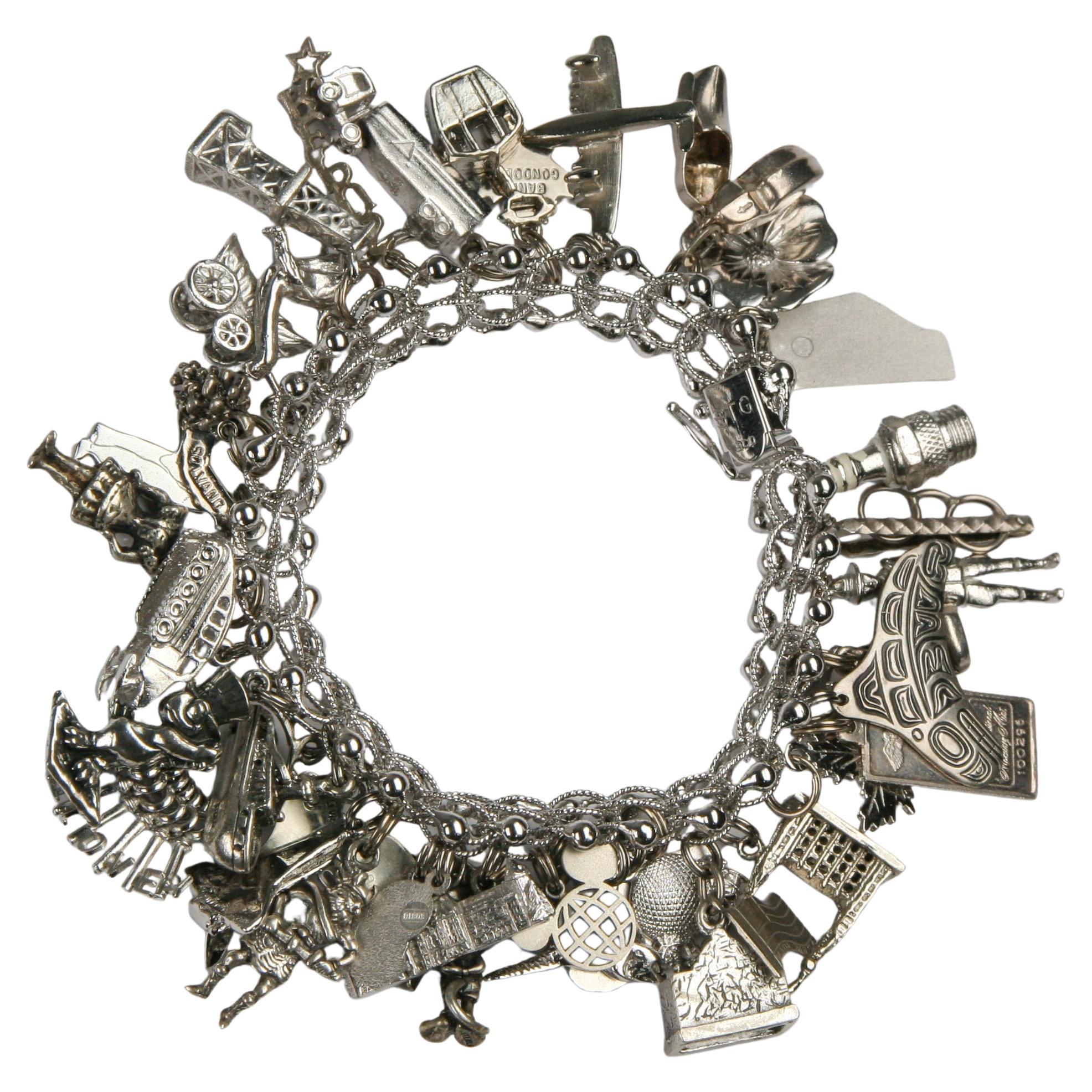 Vintage Sterling Silver Charm Bracelet with 35 Various Charms, Size 7