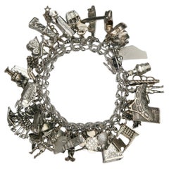 Vintage Sterling Silver Charm Bracelet with 35 Various Charms, Size 7