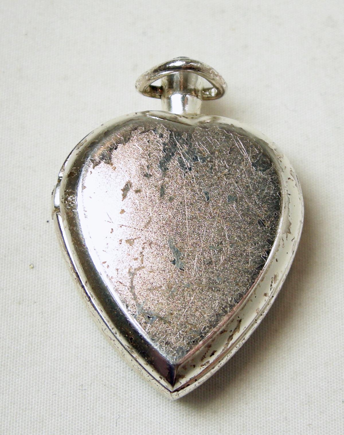 silver pendant watch