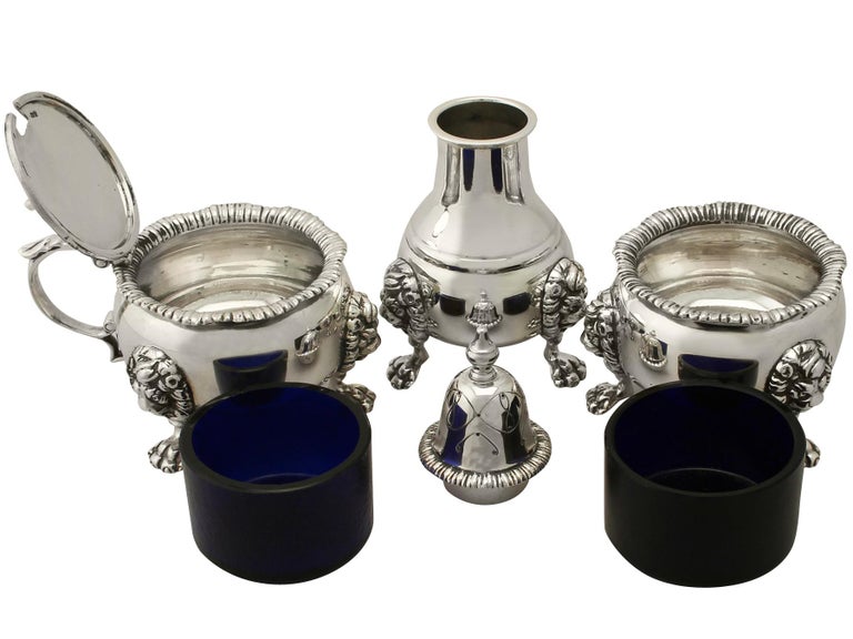 An exceptional, fine and impressive vintage Elizabeth II English sterling silver three-piece condiment set, an addition to our dining silverware collection.

This exceptional vintage Elizabeth II sterling silver three-piece condiment set consists