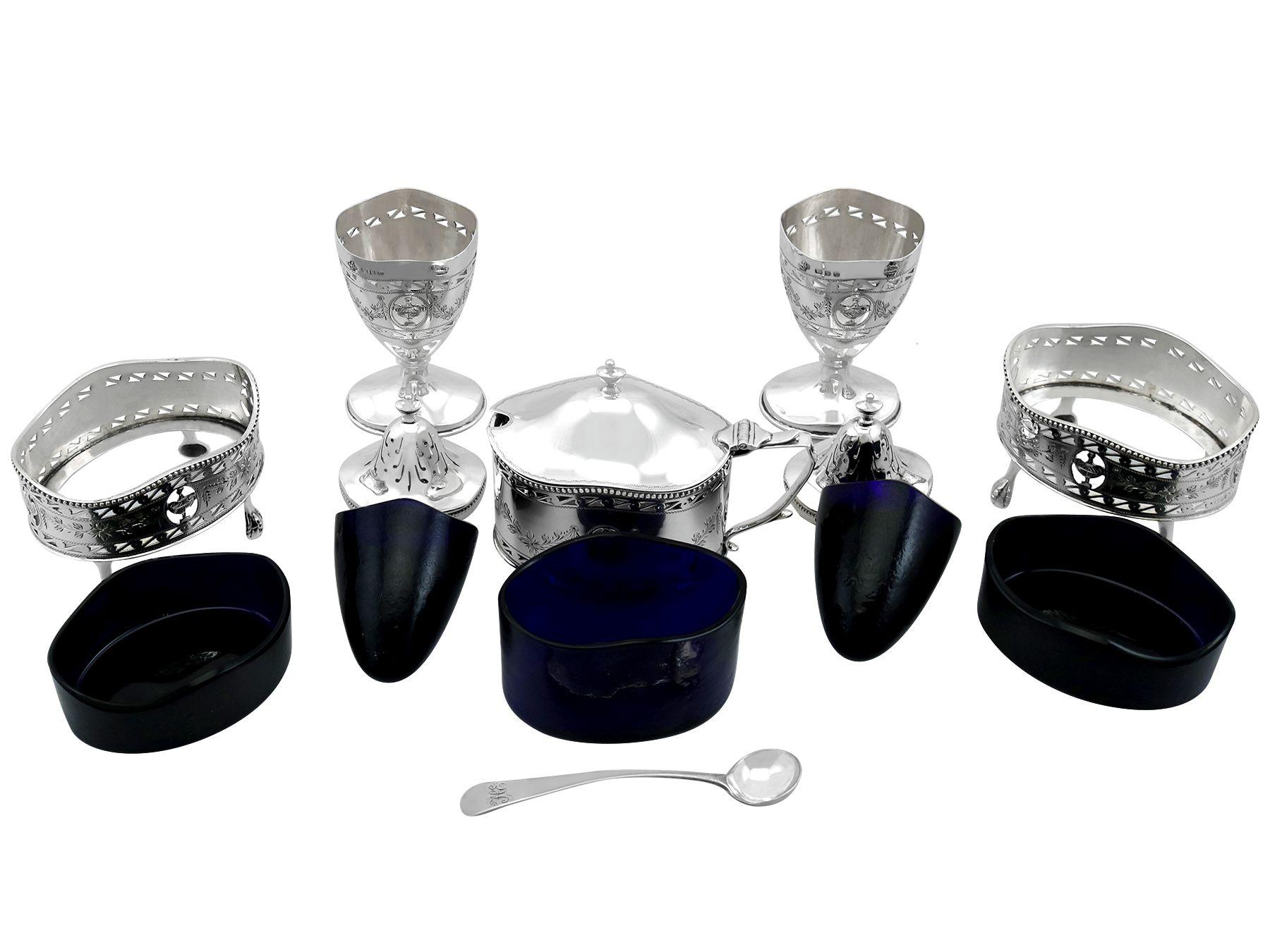 An exceptional, fine and impressive vintage Elizabeth II English sterling silver five piece condiment / cruet set made in the Adams style; an addition to our dining silverware collection

This exceptional and large vintage 5 piece condiment set in