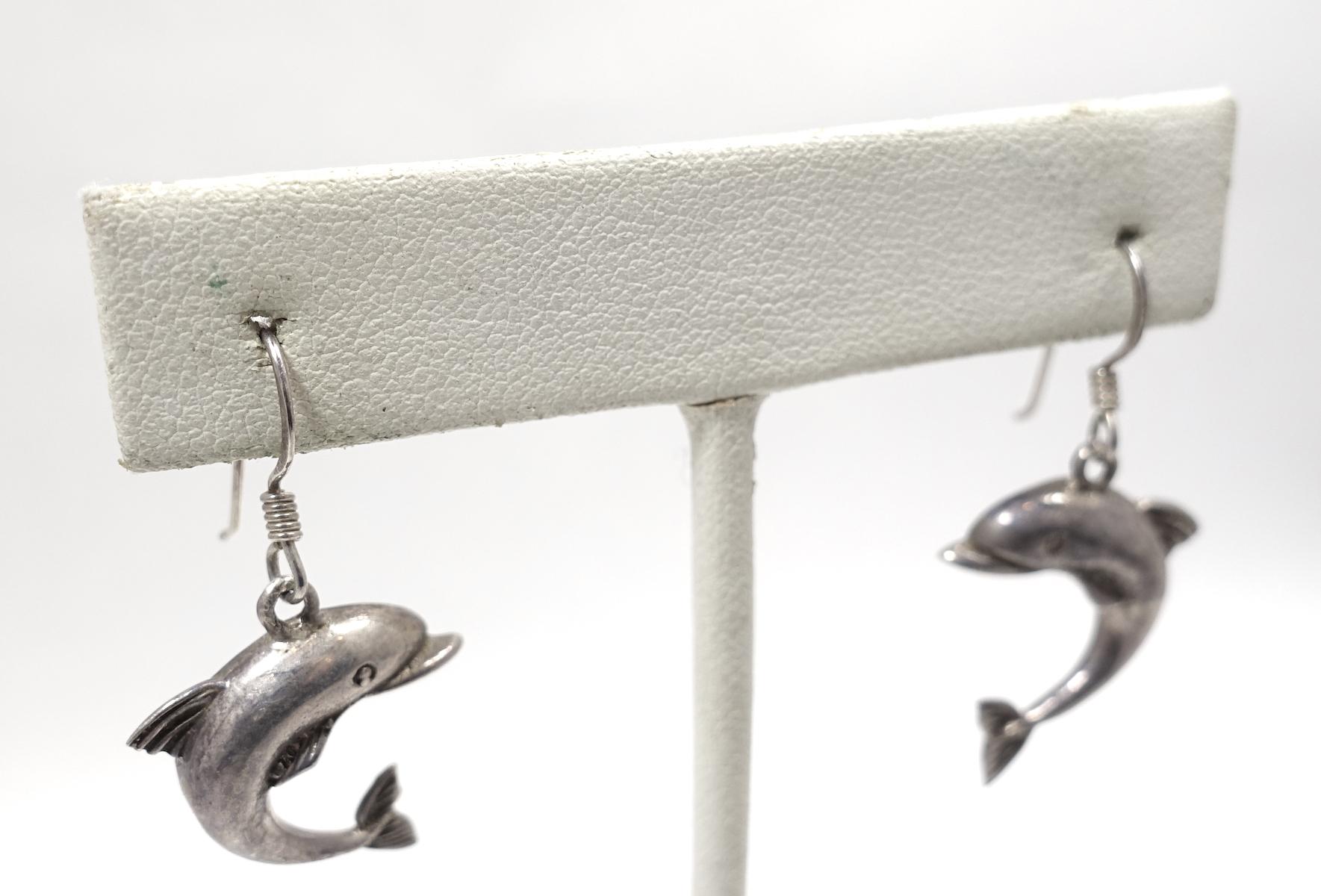 silver dolphin earrings