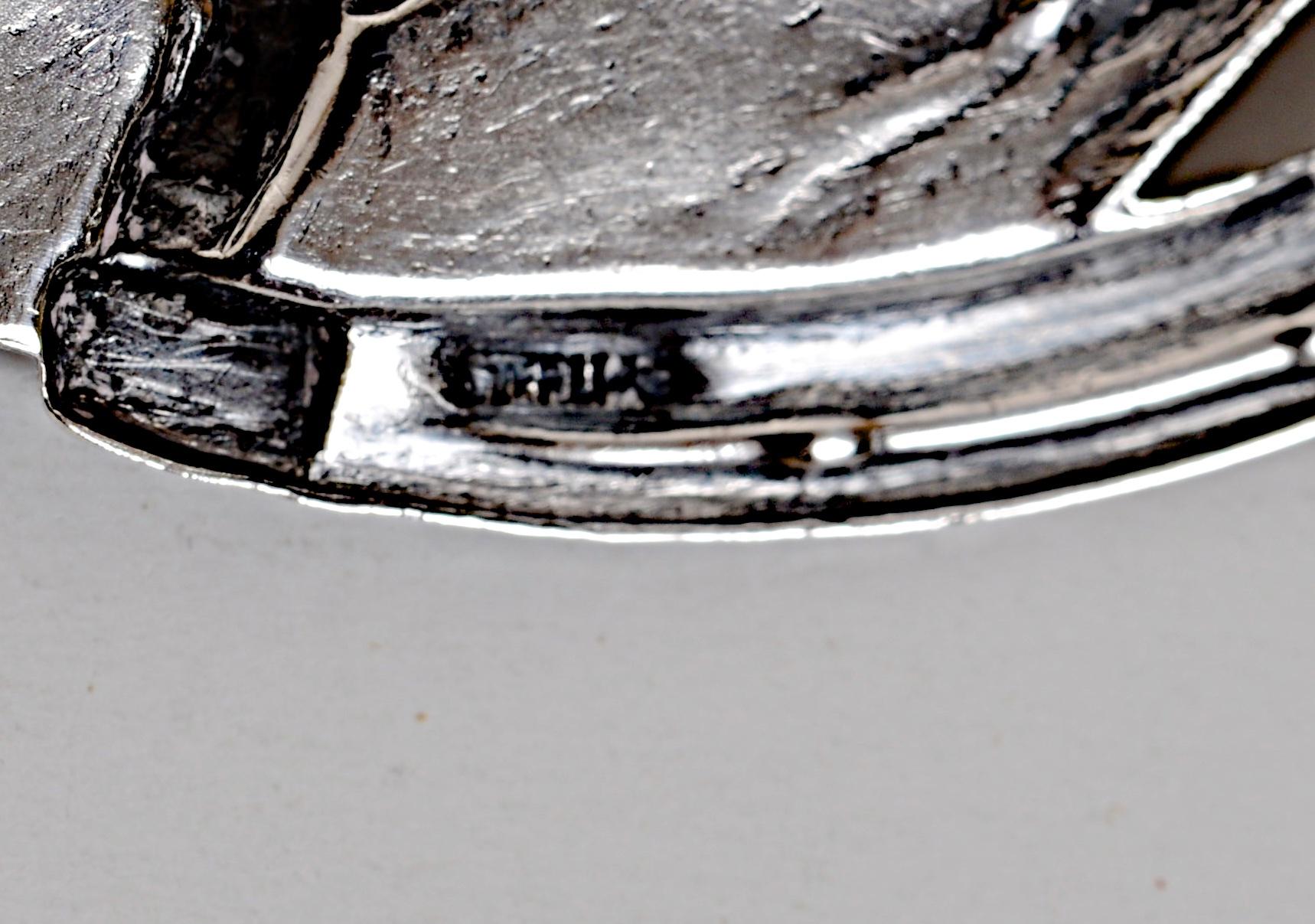 Vintage Sterling Silver Equestrian Horse Pin with Bit And Bridle. Beautifully modeled life like embossed horse surrounded by a horseshoe and wearing a bridle. With locking pin. Marked sterling. 
Trent Antiques has been a respected name in antiques