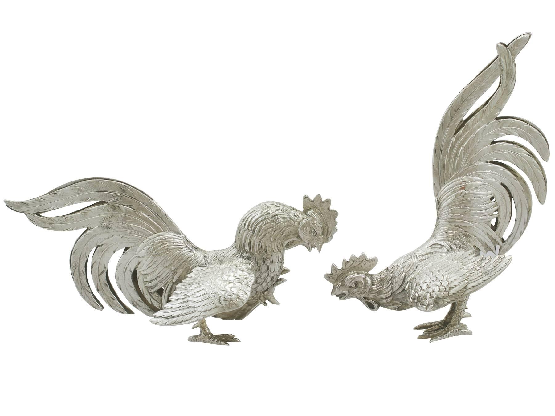 An exceptional, fine and impressive pair of vintage English cast sterling silver fighting cockerel ornaments by Israel Freeman & Son Ltd; an addition to our ornamental continental silverware collection.

These exceptional vintage cast sterling