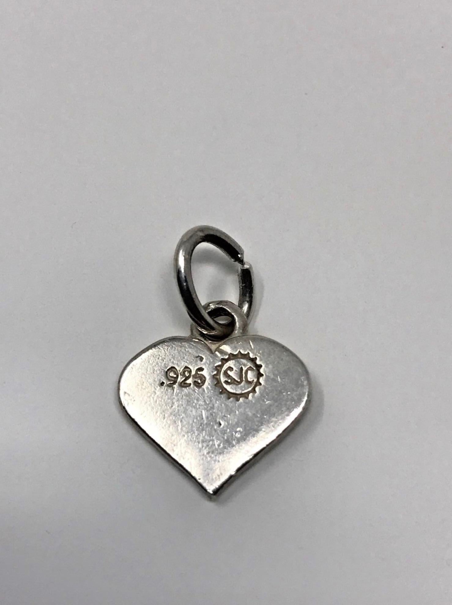 Model - Vintage Sterling Silver Flag Heart

Condition - Exceptional

SKU - 1044-20

Original Retail - $99.00

Dimensions - .7 x .6 x .1

Closure Type - Not Applicable

Material - Sterling Silver

Comes with - No Additional Accessories