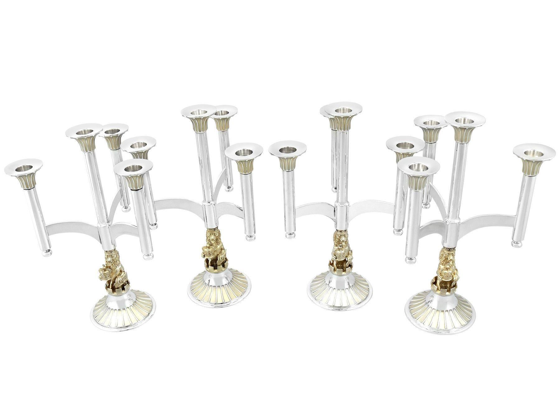 An exceptional, fine and impressive set of vintage Elizabeth II English parcel gilt sterling silver four light candelabra; an addition to our ornamental silverware collection.

These exceptional vintage Elizabeth II sterling silver candelabra have a