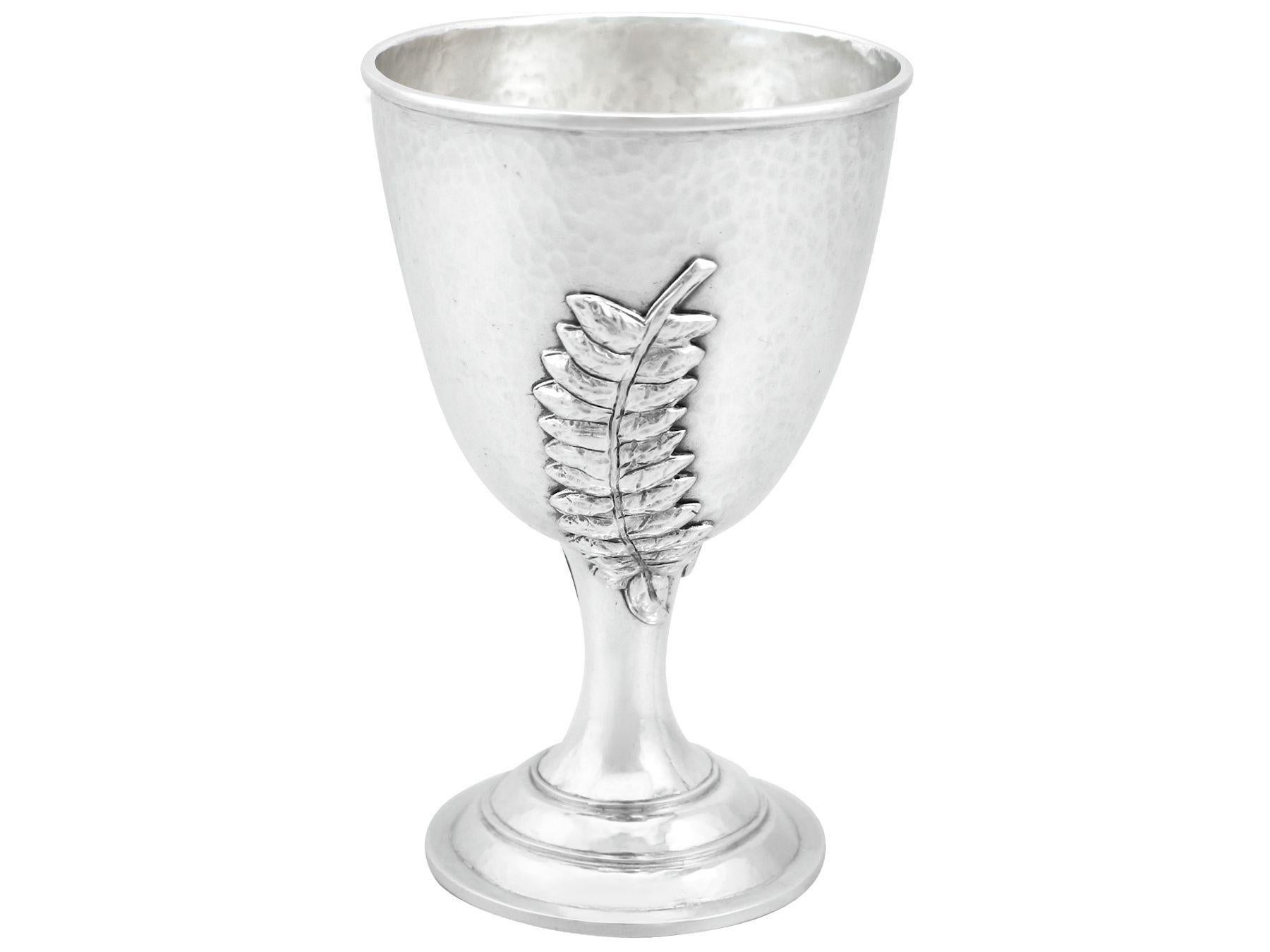 An exceptional, fine and impressive vintage Elizabeth II English sterling silver goblet; an addition to our wine and drinks related silverware collection

This exceptional vintage Elizabeth II sterling silver goblet has a circular bell-shaped form