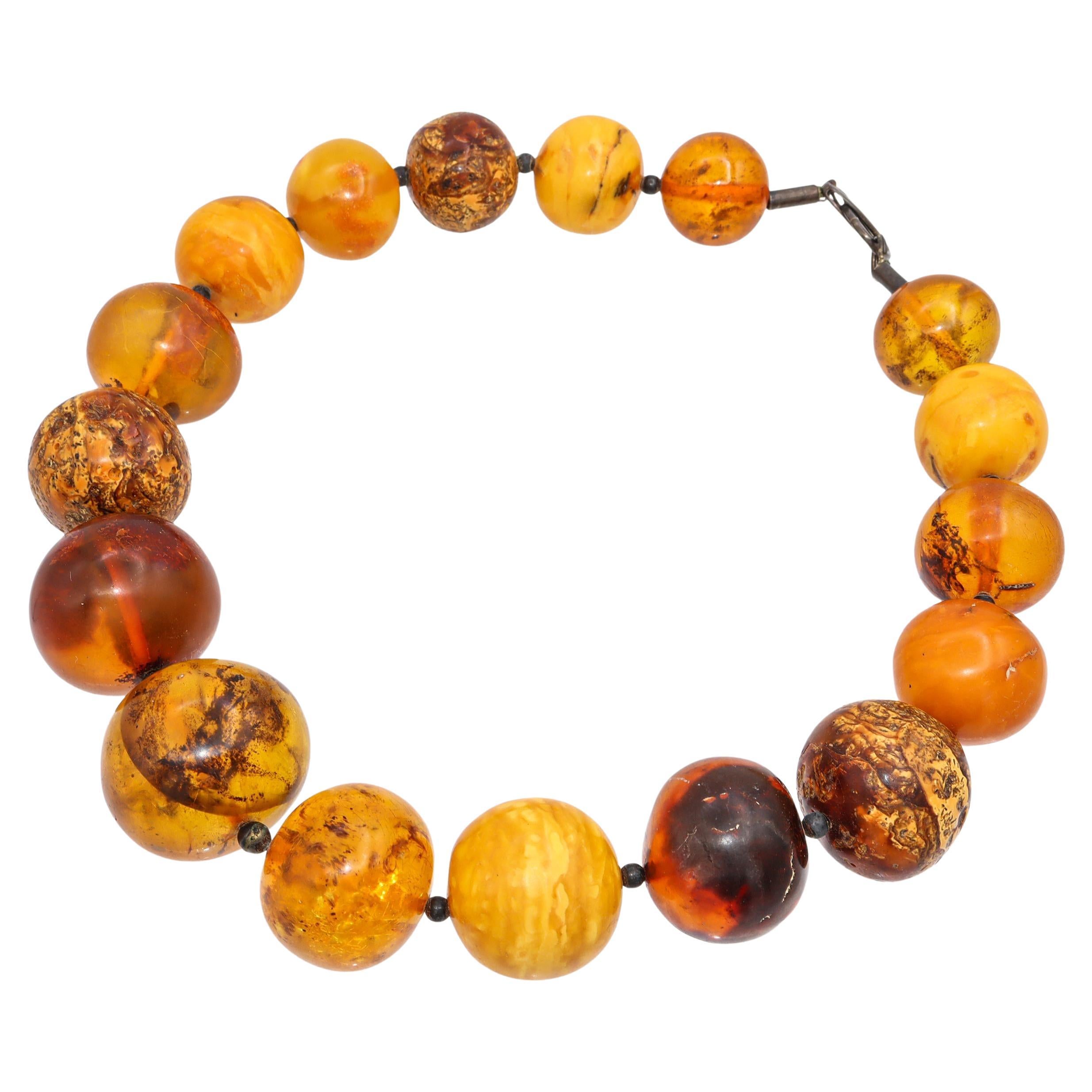What do amber bead necklaces do?