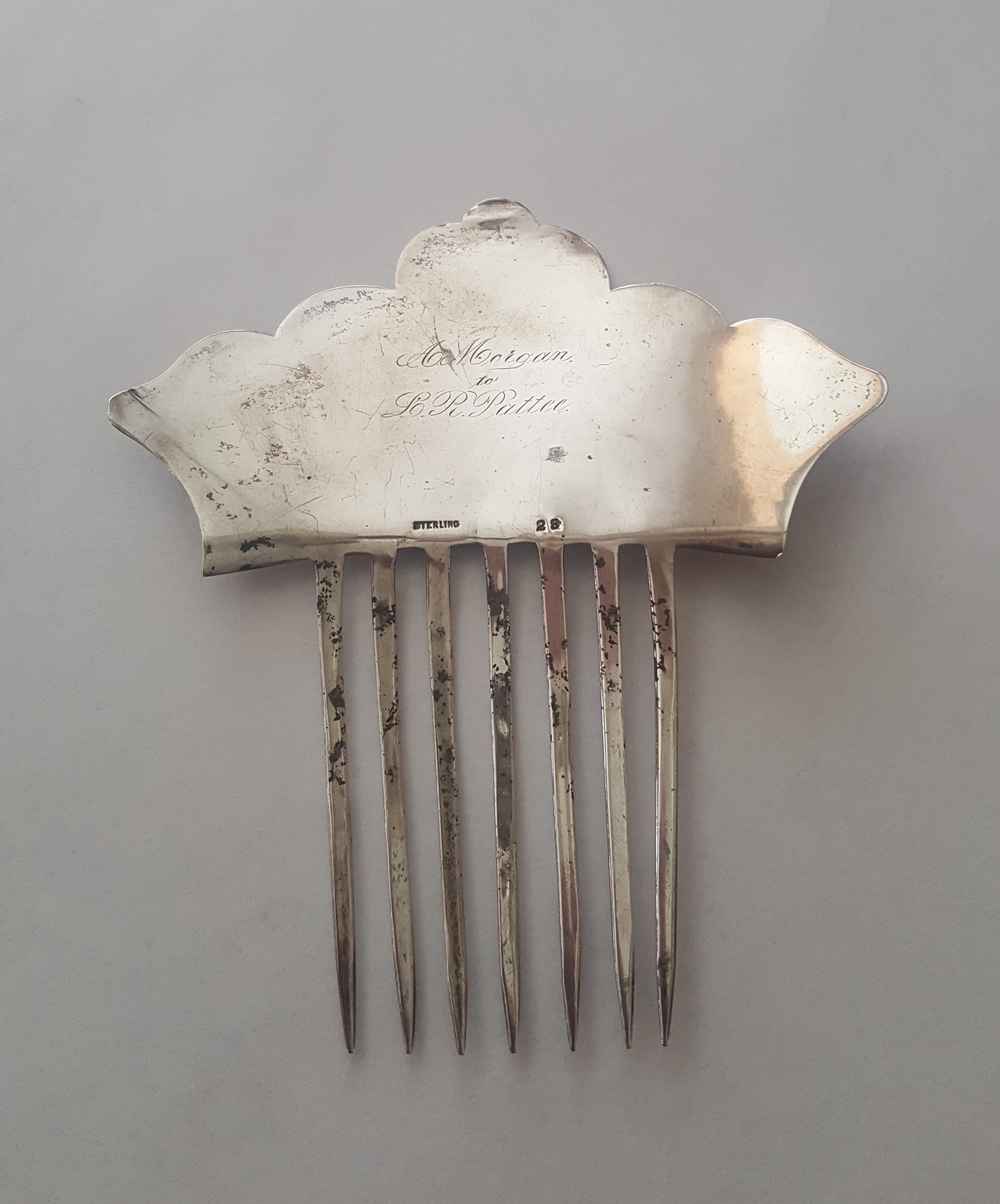Vintage Sterling Silver Hair Comb, Late 1800's, Beautifully Hand Engraved, 37.6 Grams, 5 in X 4.5 in, Very Good Condition, Victorian

This comb has an engraving on the back that says 