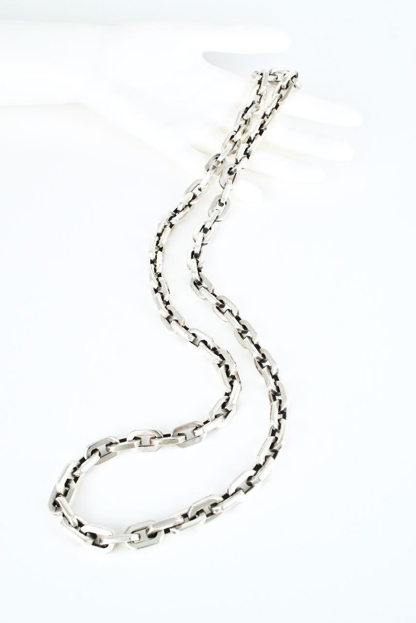 A vintage solid silver chain necklace of a heavy gauge rectangular link - a great unisex long length necklace in an interesting link that has a very contemporary feel to the design - marked 925 for sterling silver and an unidentified maker - total