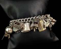 Vintage sterling silver loaded charm bracelet, Heavy, Mid century