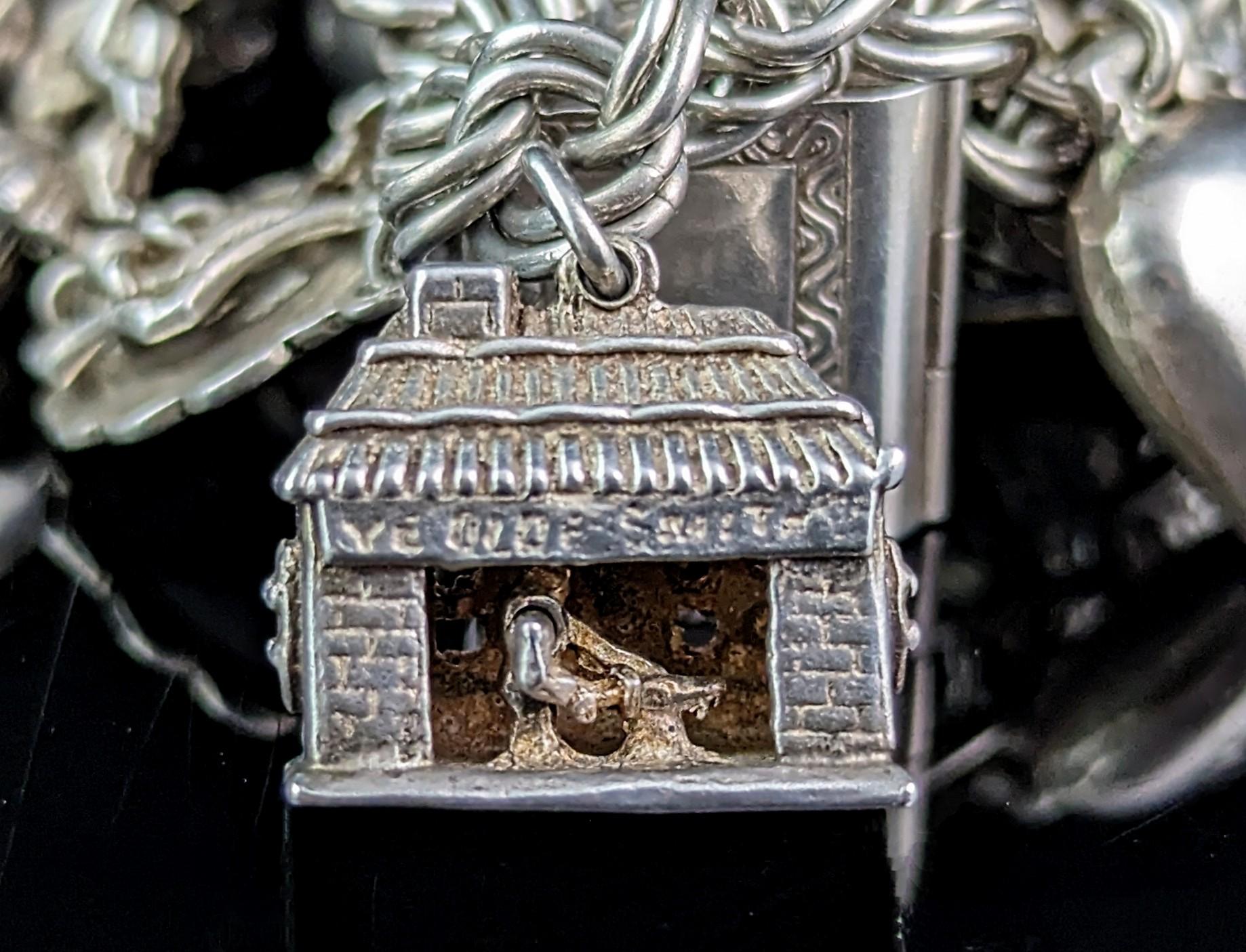 Women's Vintage sterling silver loaded charm bracelet, Heavy, Mid century 