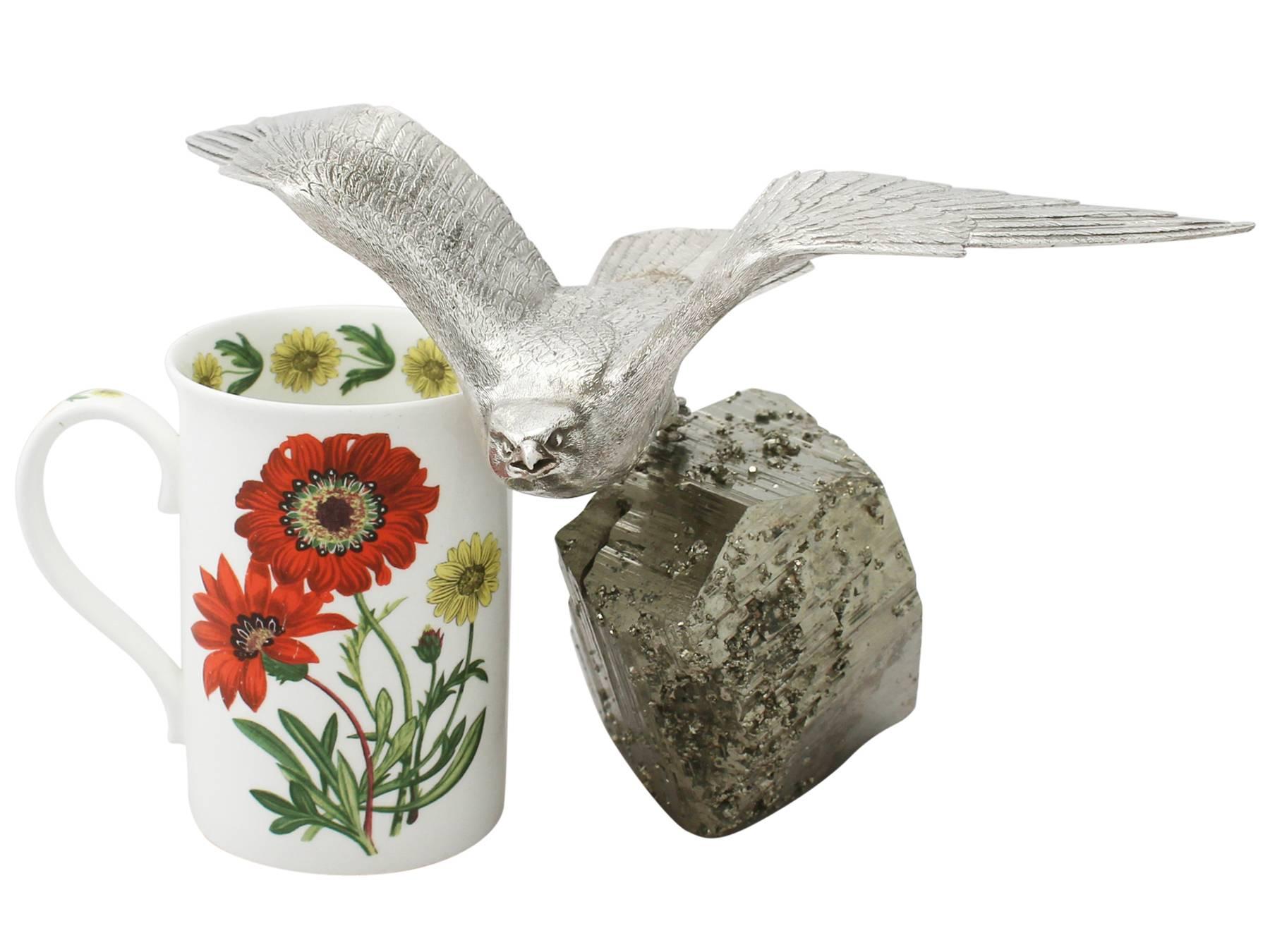 An exceptional, fine and impressive vintage Elizabeth II English cast sterling silver kestrel ornament with an iron pyrite base; an addition to our animal related silverware collection

This exceptional vintage Elizabeth II cast sterling silver