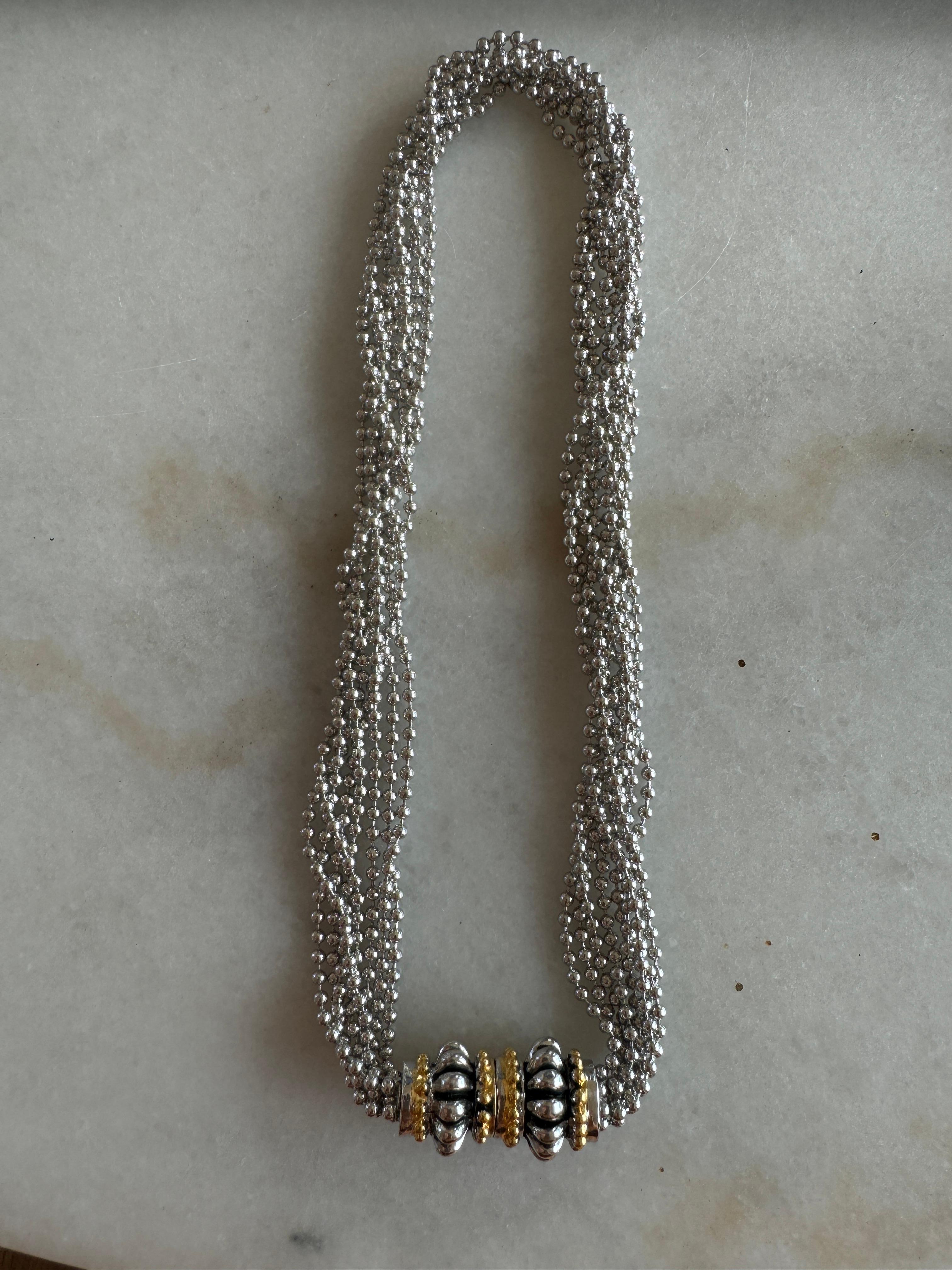 Collana Rau Klimt d'epoca in argento a più fili.
La collana è composta da 8 catene a palline e la chiusura magnetica centrale è decorata con un design placcato oro. 