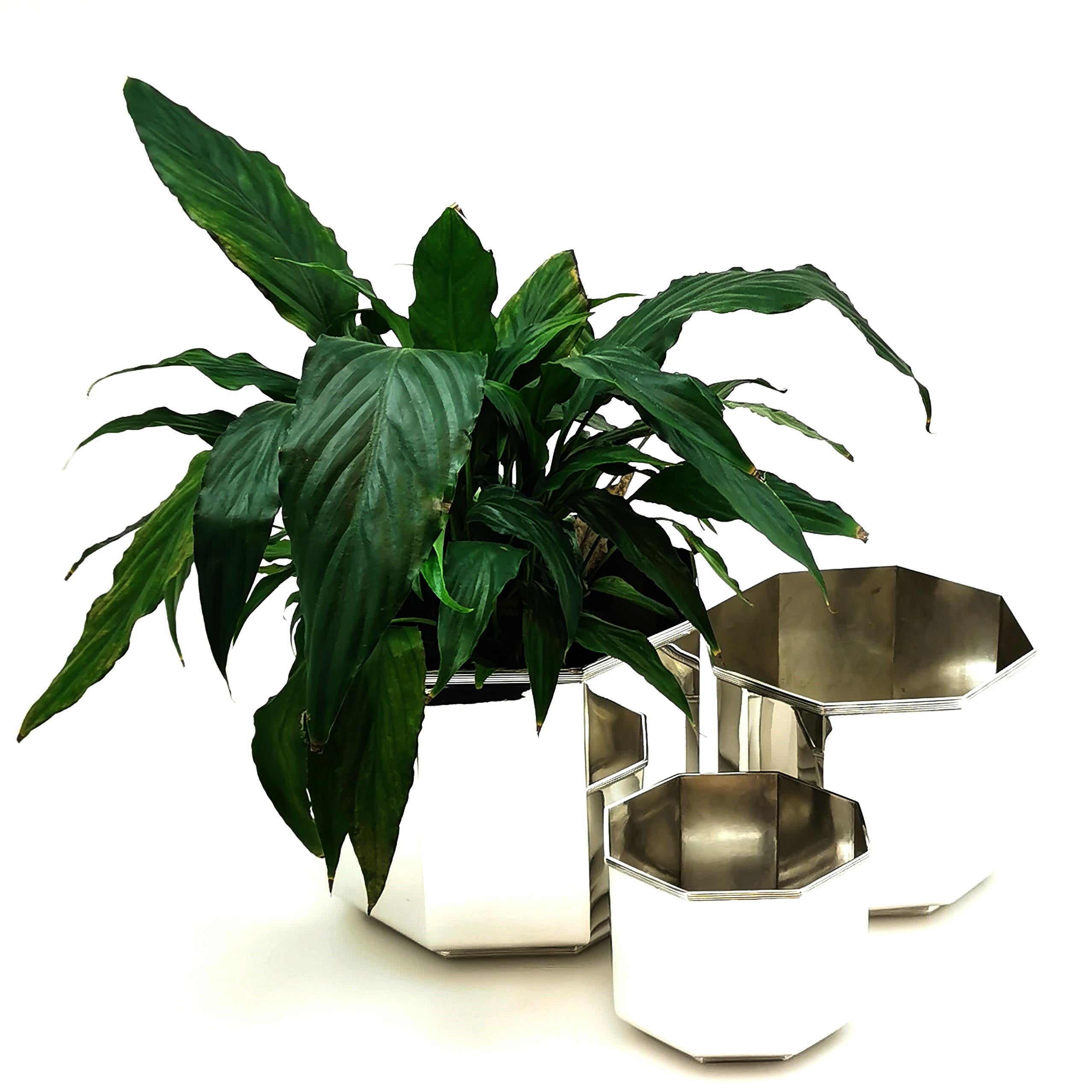 A magnificent Suite of 3 Modernist Italian solid silver octagonal pots - Perfect for a multiple of uses. These are suitable as a set of Coolers for wine & Champagne with a smaller Ice Bucket, as well as working for plants or flowers. These elegant