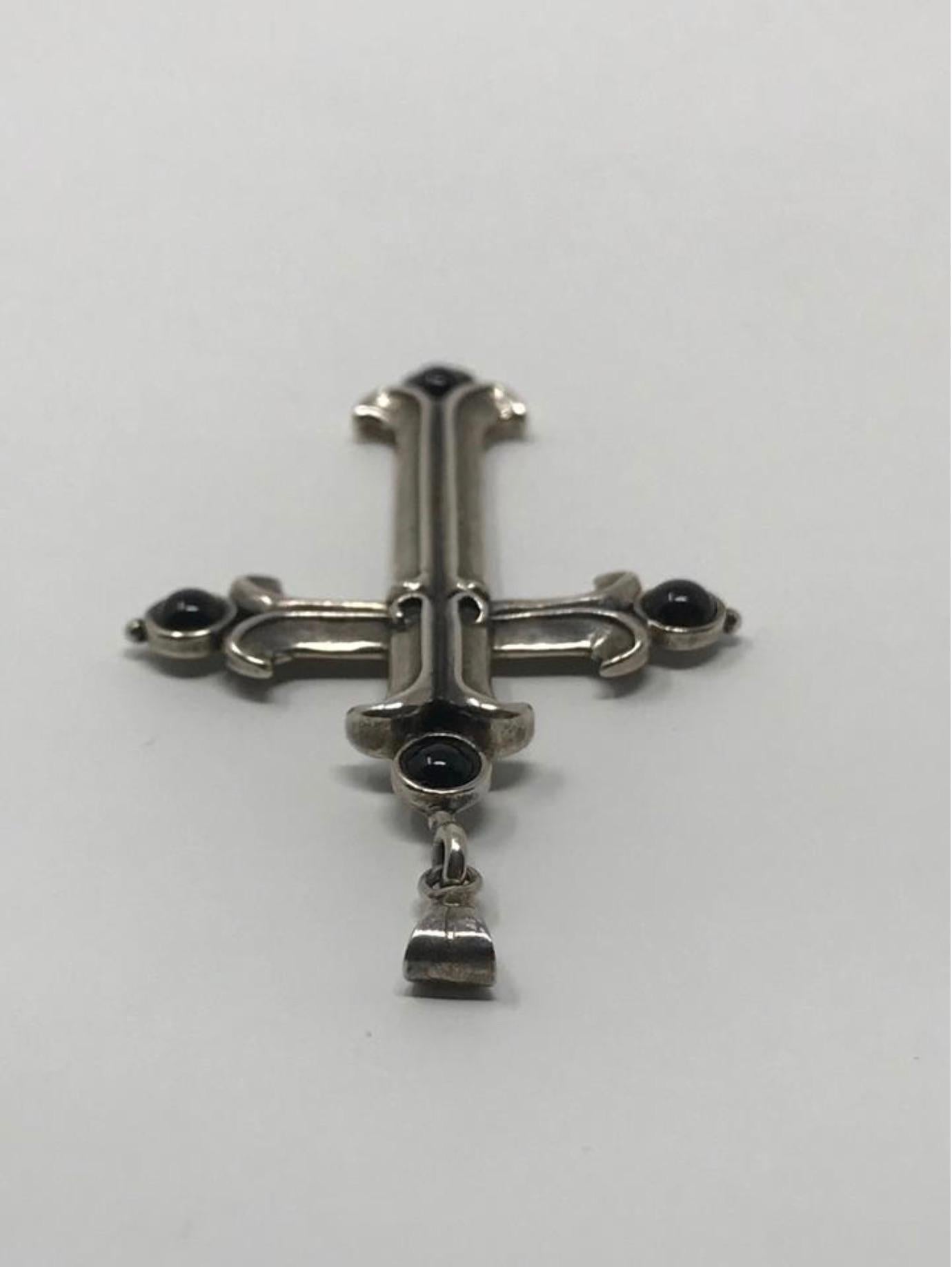 Item - Vintage Sterling Silver Onyx Crucifix Pendent

Condition - Exceptional

SKU - 1558

Original Retail Price - $175 + tax

Dimensions - 37mm x 56mm x 5mm

Material - Silver .925

Weight - 6.75 oz

Comes with - No Additional