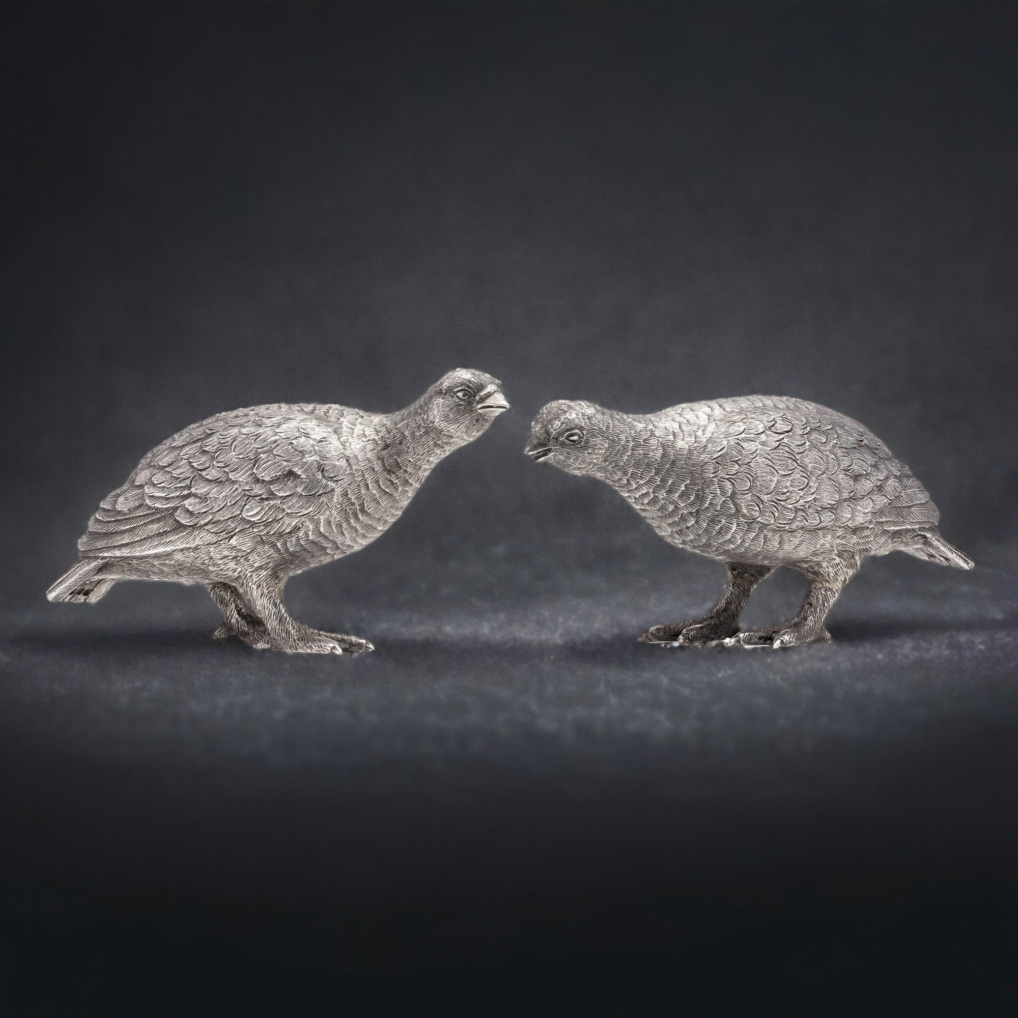 Vintage sterling silver pair of grouse bird models. 
Made in England, London, 1966
Maker: William Comyns & Sons Ltd. 
Fully hallmarked.

Dimensions:
1st bird size: Length x width x height: 13 x 4.3 x 6.5 cm 
2nd bird size: Length x width x height: