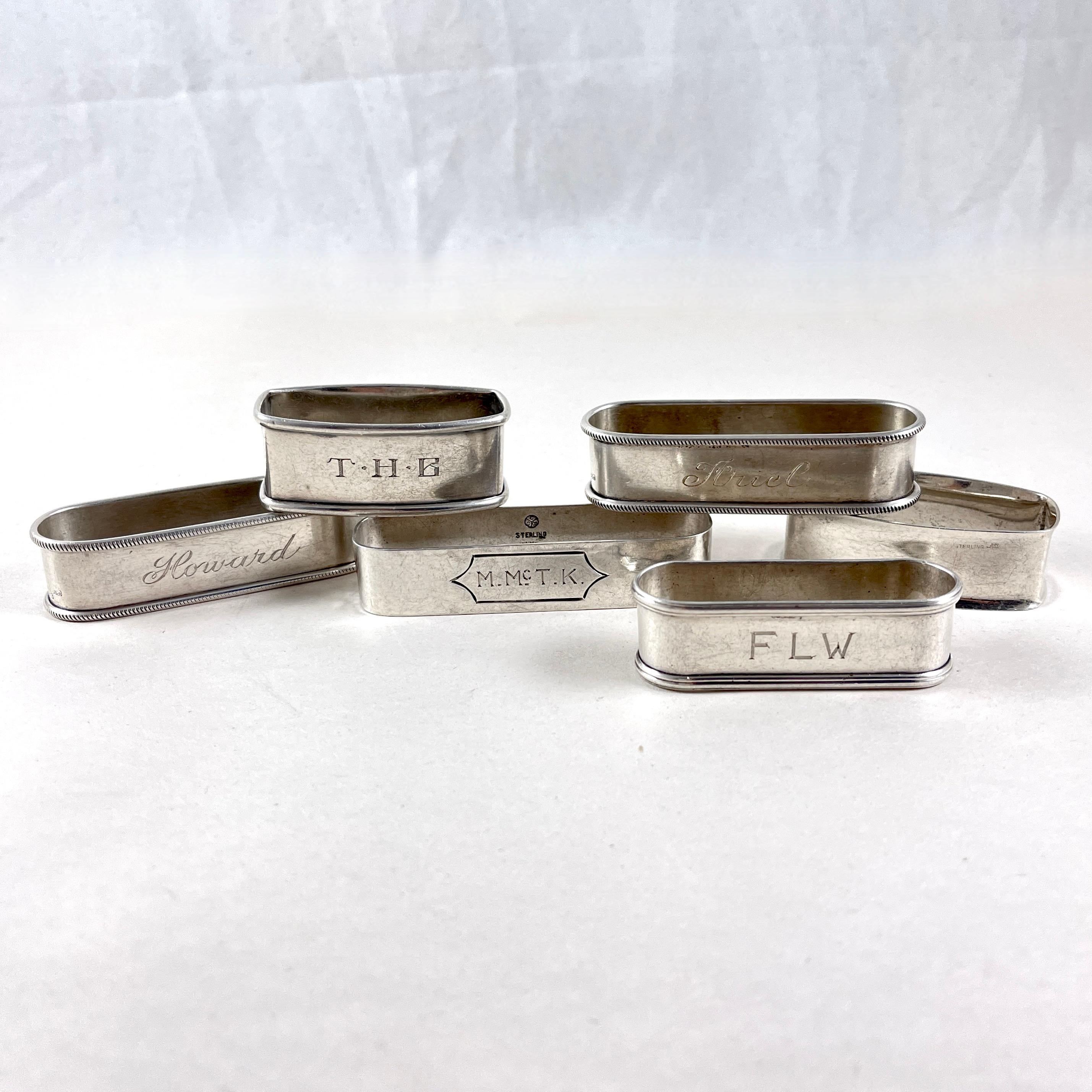 Un set assemblato di sei portatovaglioli in argento Sterling Estate, di vari produttori, circa 1930.

I sei anelli sono tutti di forma rettangolare, cinque anelli sono monogrammati: Howard, Ariel, FLW, M.McT.K., THB.  Gli stili di incisione variano,