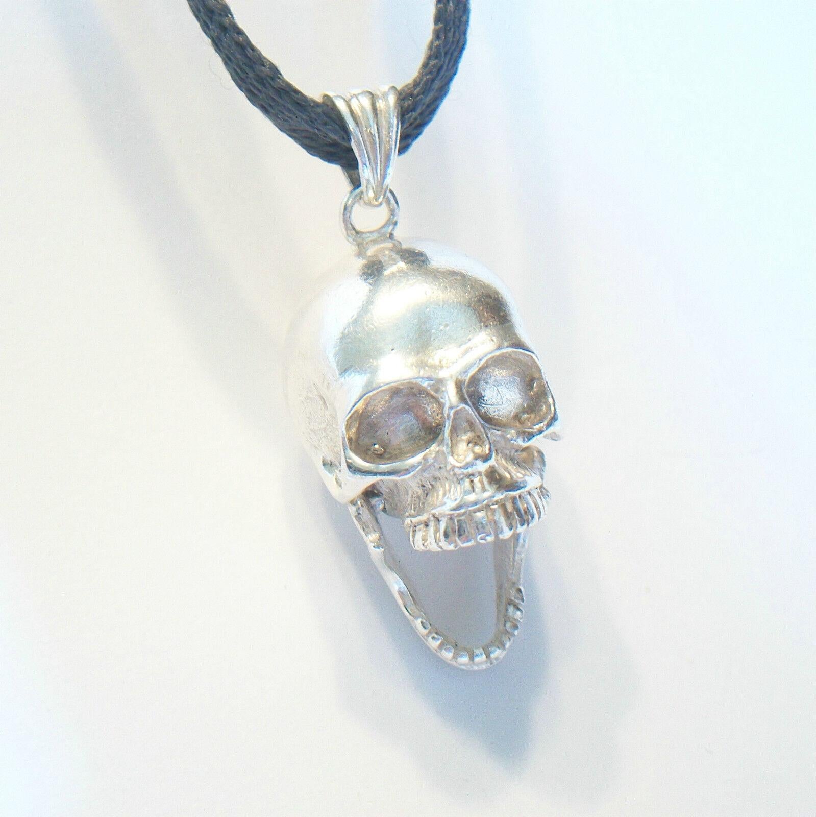 silver skull charm