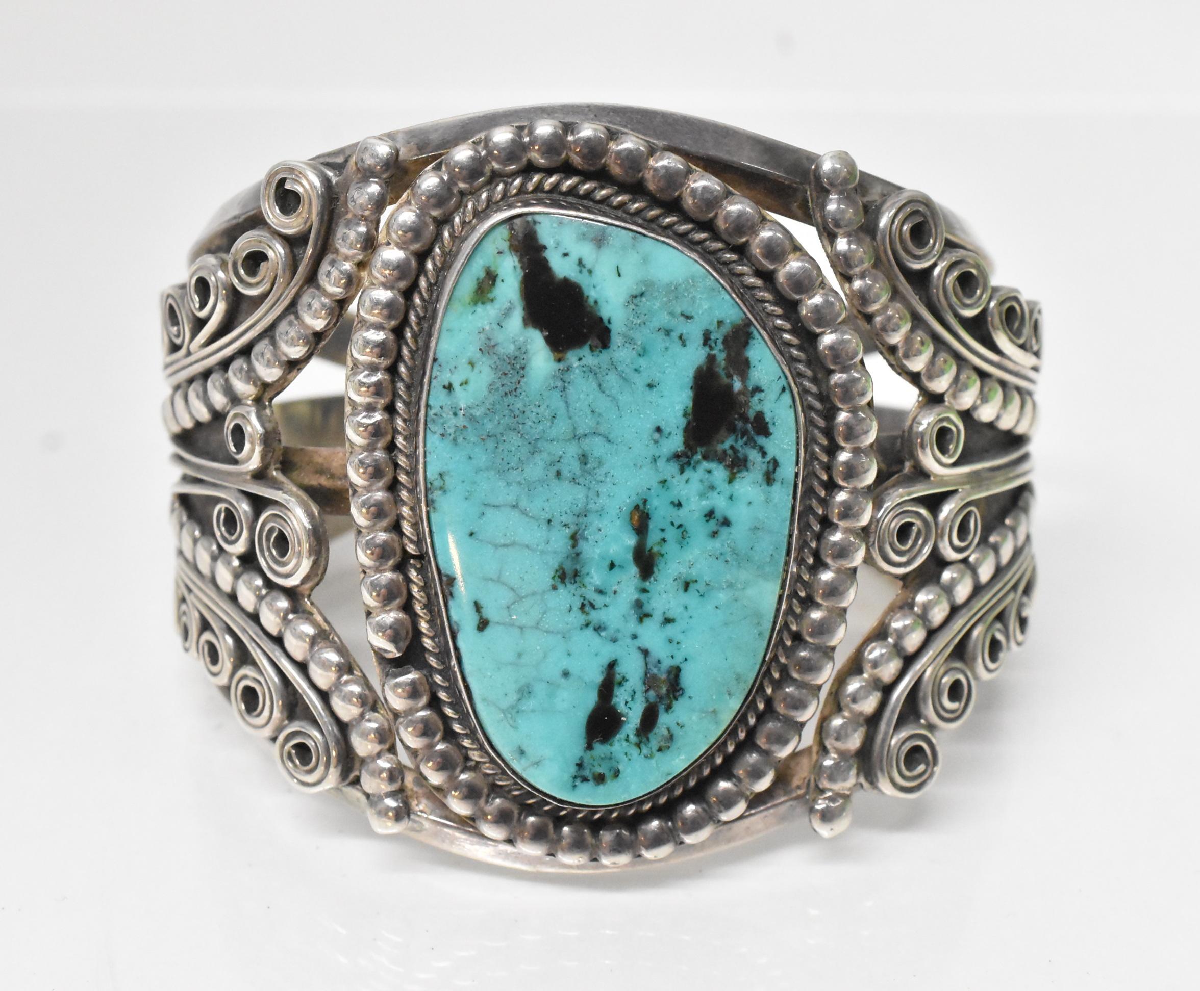 Vintage tested sterling silver and turquoise cuff bracelet. Very good condition. Stone measures 1 3/4